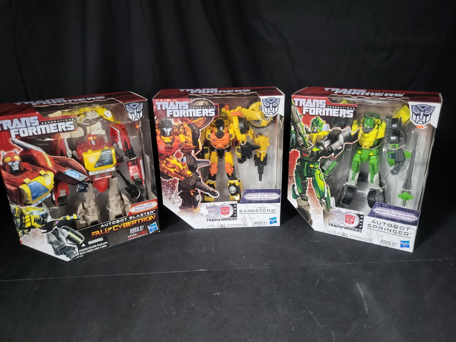 I03538 | Three Hasbro Transformers Generations Voyager Class Action Figures Including Autobot (1 of 8)