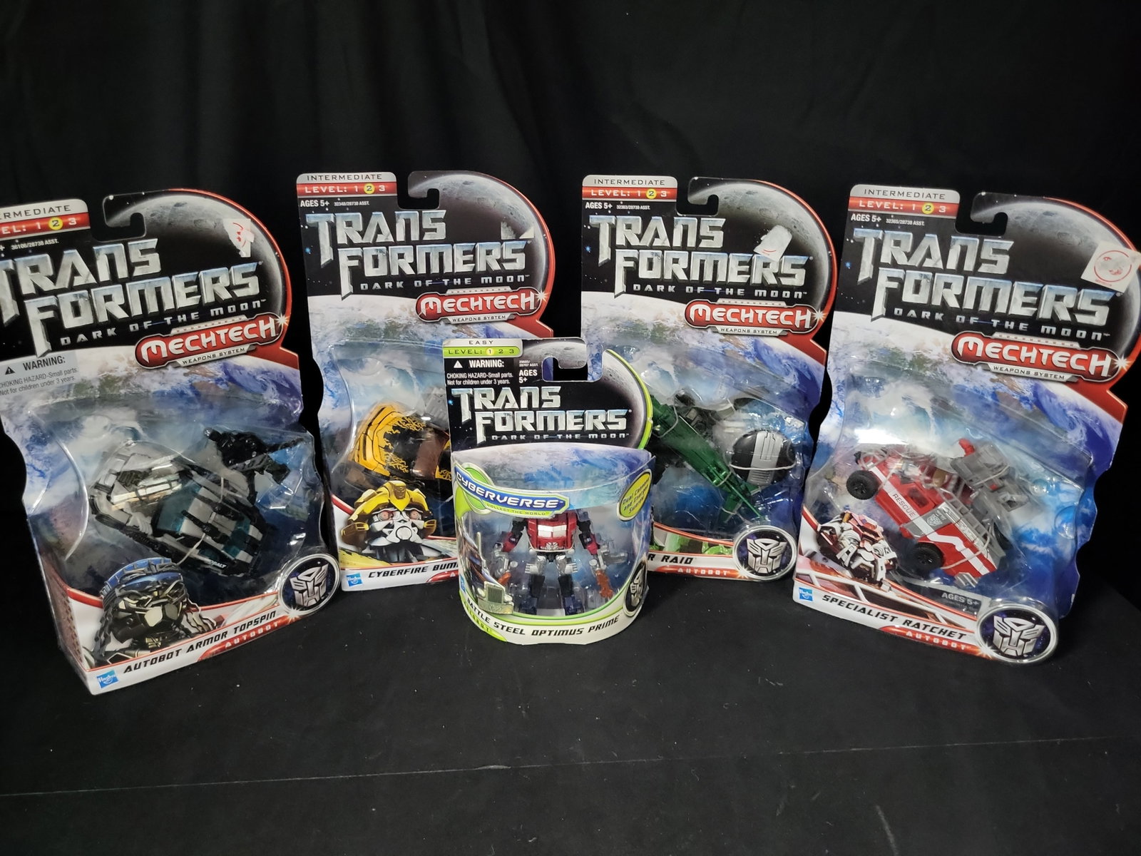 I03548 | A Collection of Five Hasbro Transformers Dark of the Moon Factory Sealed Action Figures (1 of 13)