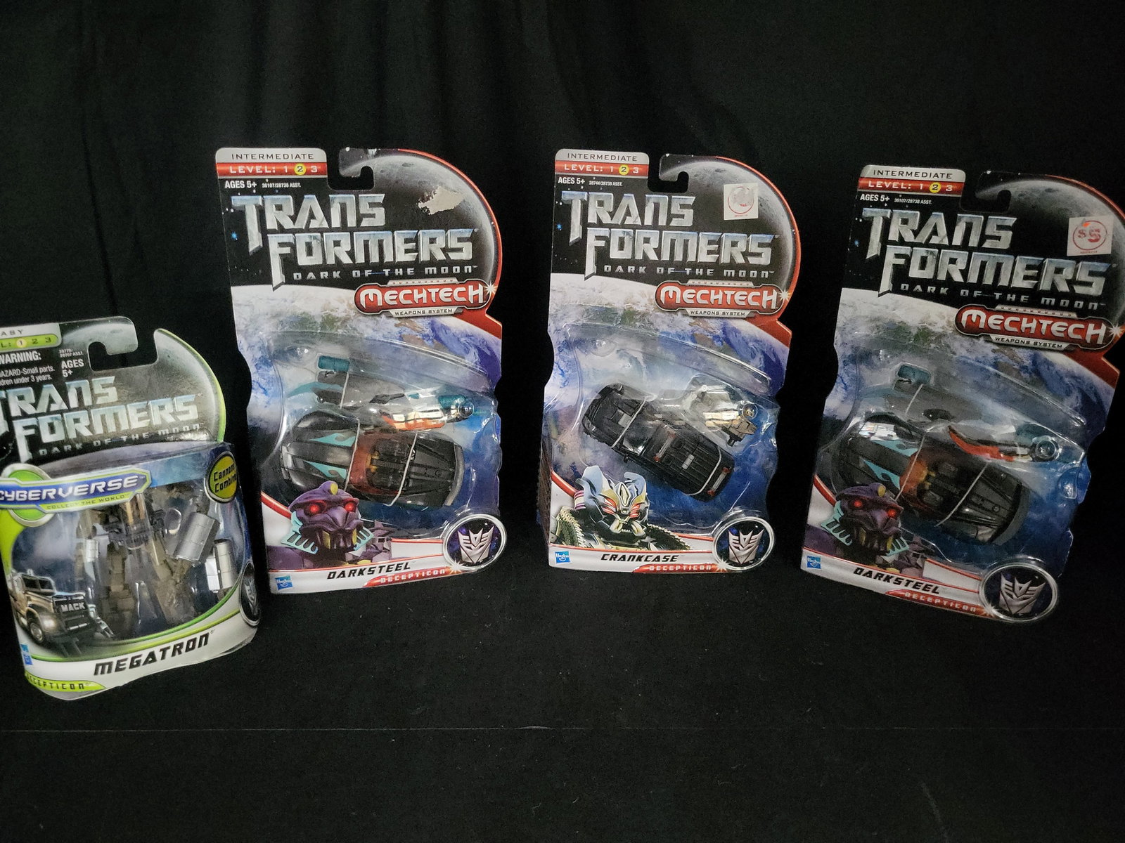 I03545 | A Group of Four Hasbro Transformers Dark of the Moon Action Figures (1 of 15)