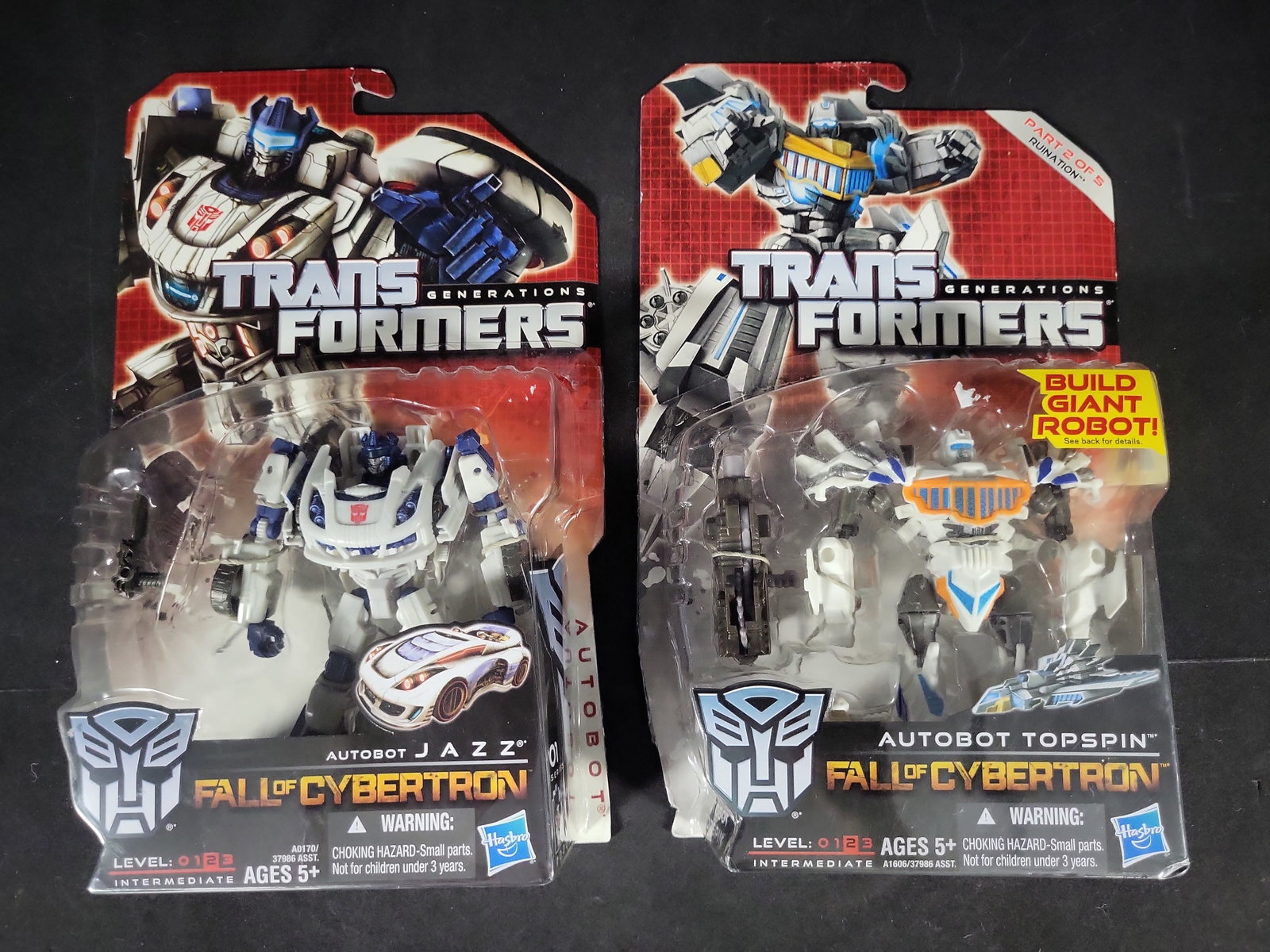 I03521 | A Pair of Hasbro Transformers Generations Fall of Cybertron Action Figures Jazz and Topspin (1 of 4)