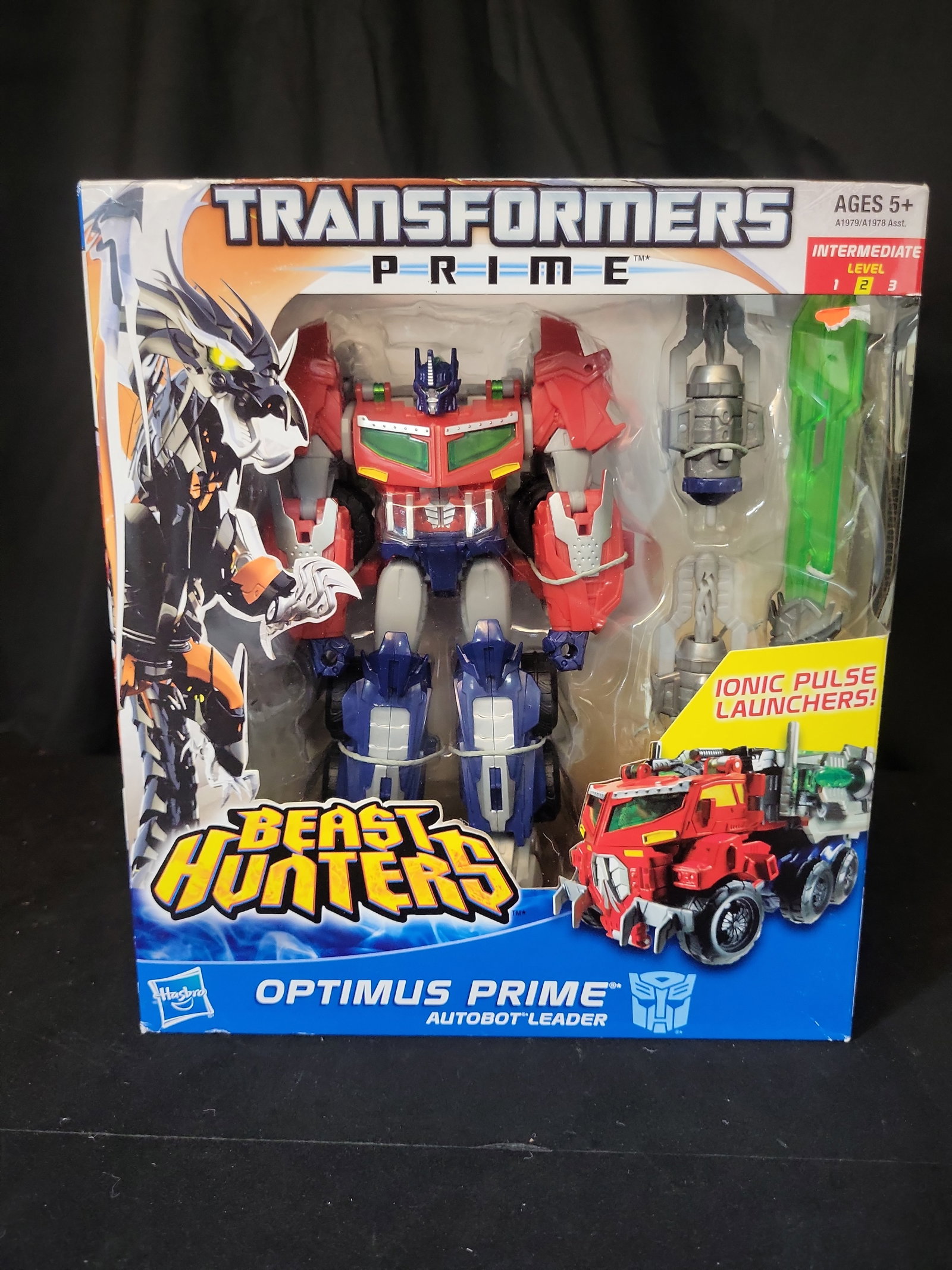 I03504 | Hasbro Transformers Prime Beast Hunters Voyager Class Optimus Prime Action Figure (1 of 7)