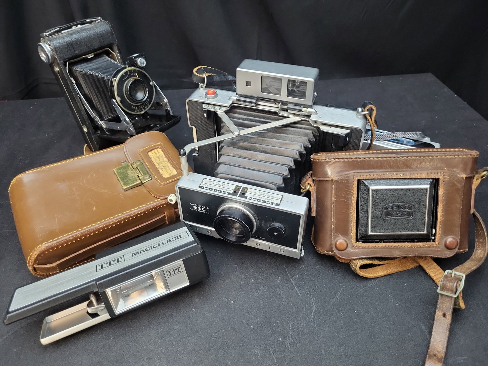I03637 | A Collection of Vintage Folding and Instant Cameras with Accessories (1 of 16)