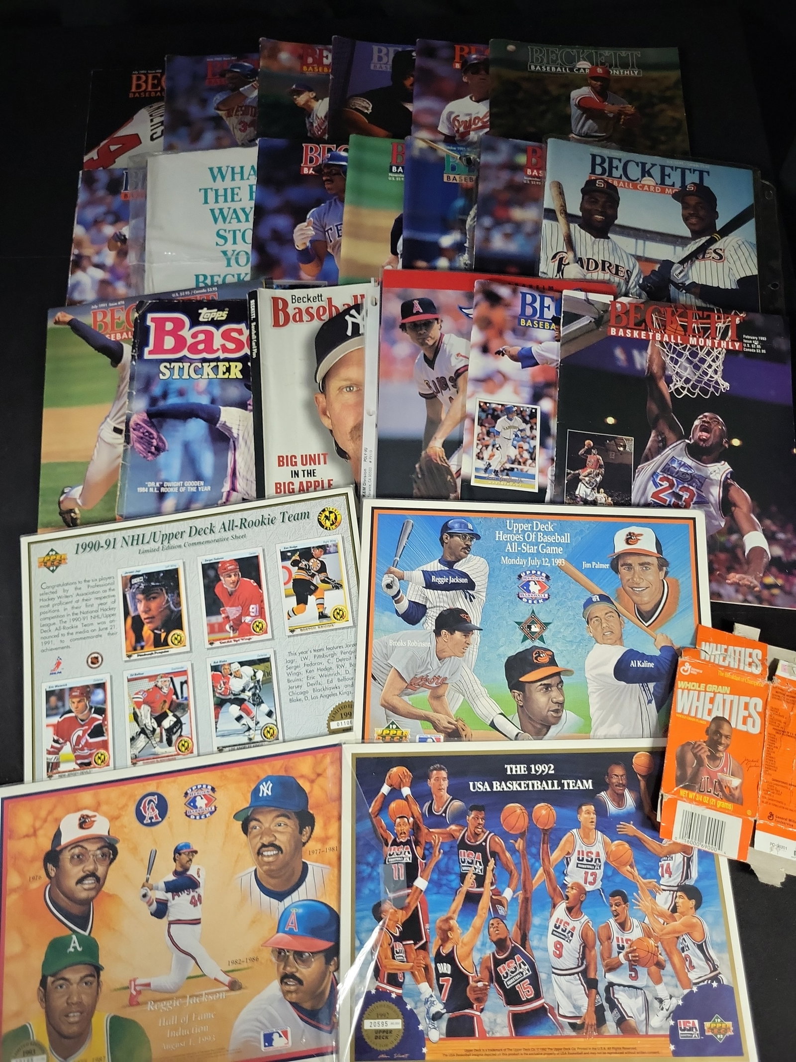 I03847 | An Assortment of Vintage Sports Memorabilia Featuring Upper Deck Commemorative Sheets and (1 of 14)