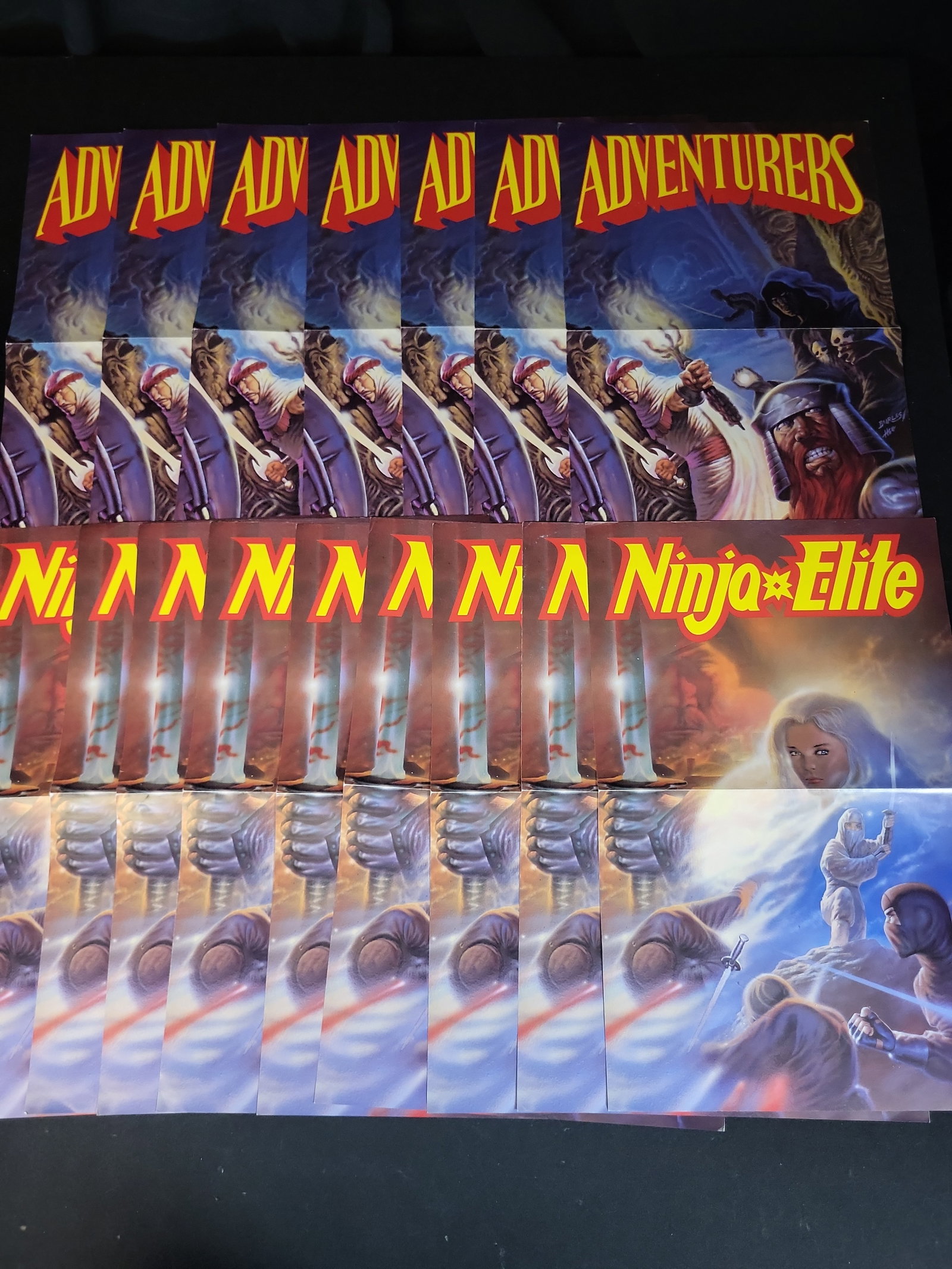 I03898 | A Collection of roughly 20 Adventurers and Ninja Elite Comic Book Cover Production Proofs (1 of 5)