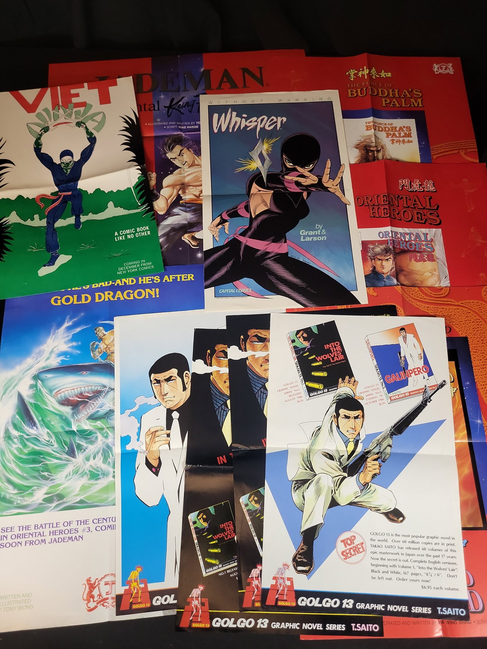 I03902 | A Collection of Vintage 1980s Comic Book Promotional Posters and Advertisements: BID PER WHAT YOU SEE IN THE PHOTO, NOT THE AI GENERATED TITLES AND DESCRIPTIONS! This lot consists of a collection of promotional paper ephemera for various comic book titles released in the mid-to-la