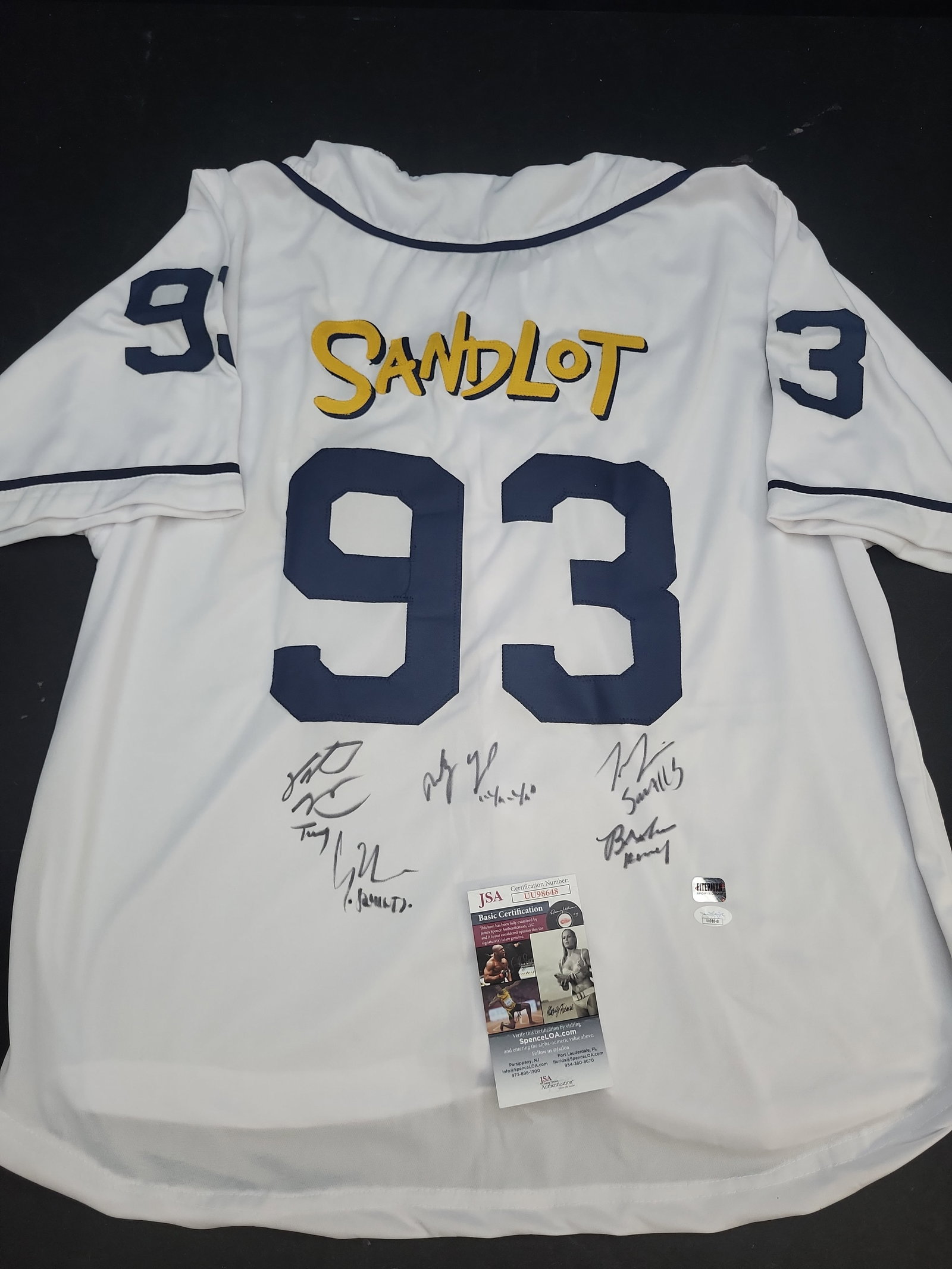 I04695 | Signed Sandlot Cast Jersey JSA: IMPORTANT â€“ PLEASE REVIEW BEFORE BIDDING: Aeron House makes every effort to accurately identify and describe each lot; however, titles and descriptions may contain errors, omissions, or AI-a