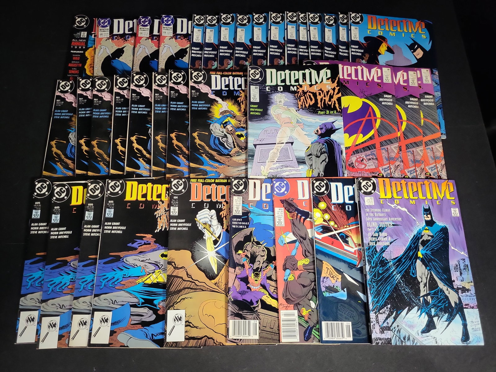 I04535 | Collection of Detective Comics Featuring Batman: IMPORTANT â€“ PLEASE REVIEW BEFORE BIDDING: Aeron House makes every effort to accurately identify and describe each lot; however, titles and descriptions may contain errors, omissions, or AI-a