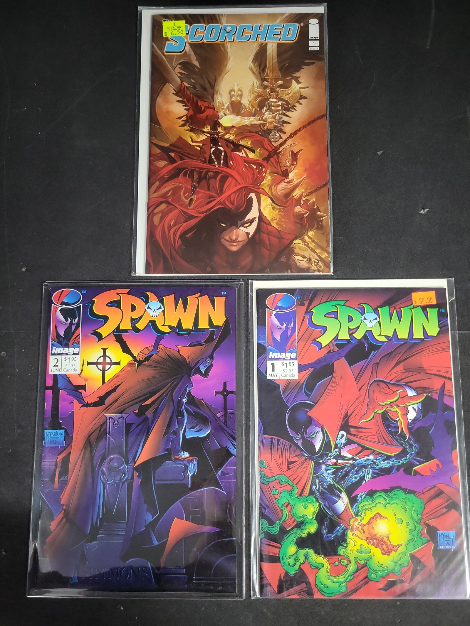 I04557 | Three Image Comics Spawn Issues: IMPORTANT â€“ PLEASE REVIEW BEFORE BIDDING: Aeron House makes every effort to accurately identify and describe each lot; however, titles and descriptions may contain errors, omissions, or AI-a