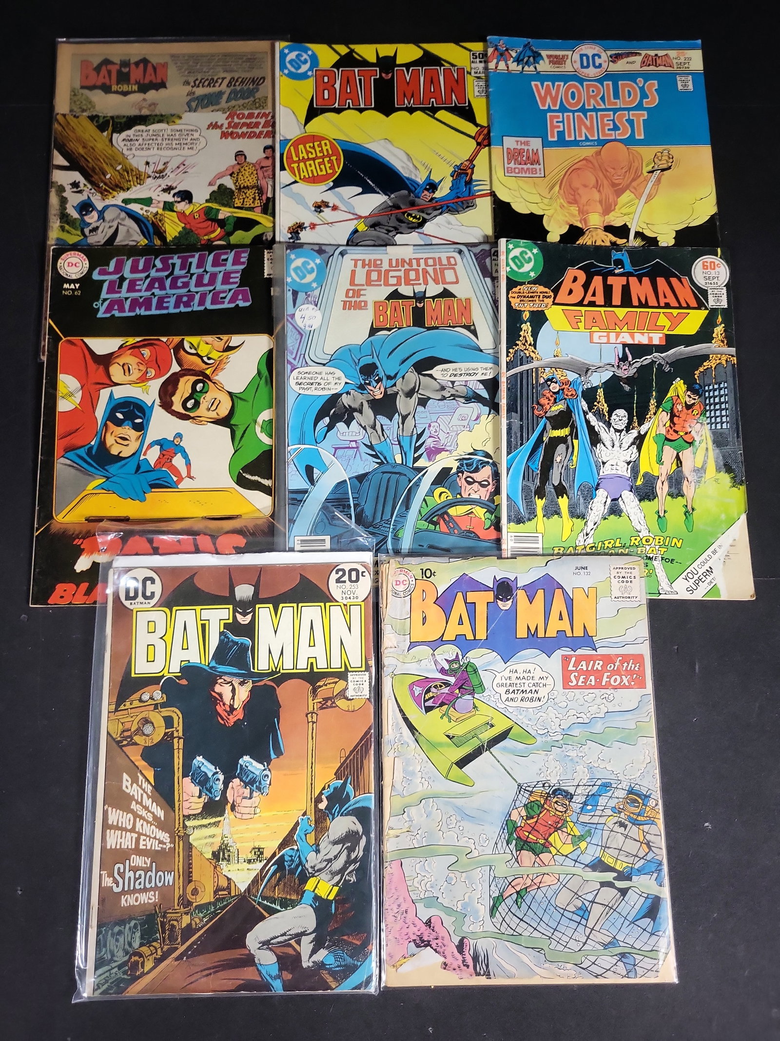 I04561 | Eight Vintage Batman DC Comics: IMPORTANT â€“ PLEASE REVIEW BEFORE BIDDING: Aeron House makes every effort to accurately identify and describe each lot; however, titles and descriptions may contain errors, omissions, or AI-a
