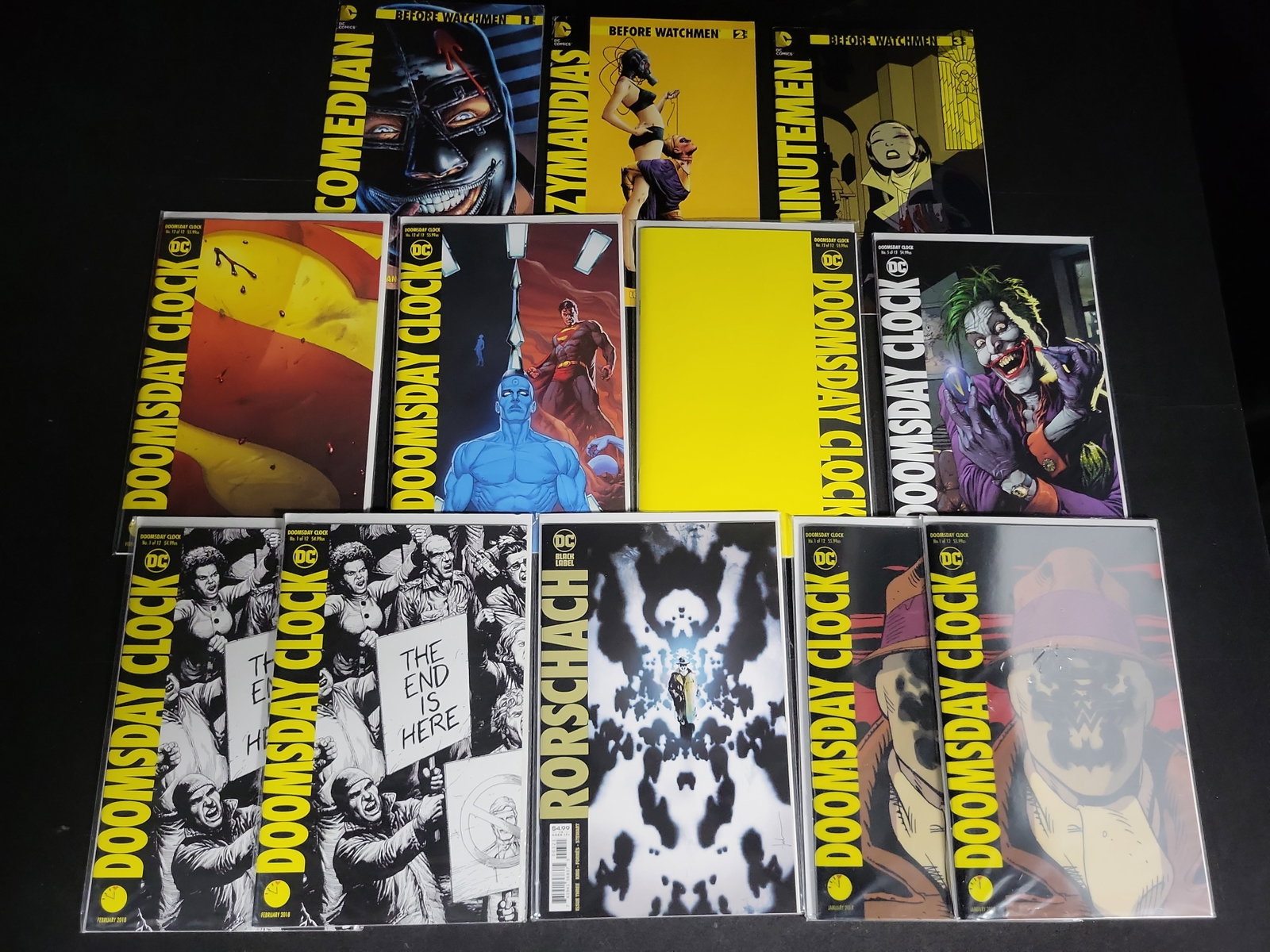 I04519 | Collection of DC Watchmen Related Comics: IMPORTANT â€“ PLEASE REVIEW BEFORE BIDDING: Aeron House makes every effort to accurately identify and describe each lot; however, titles and descriptions may contain errors, omissions, or AI-a