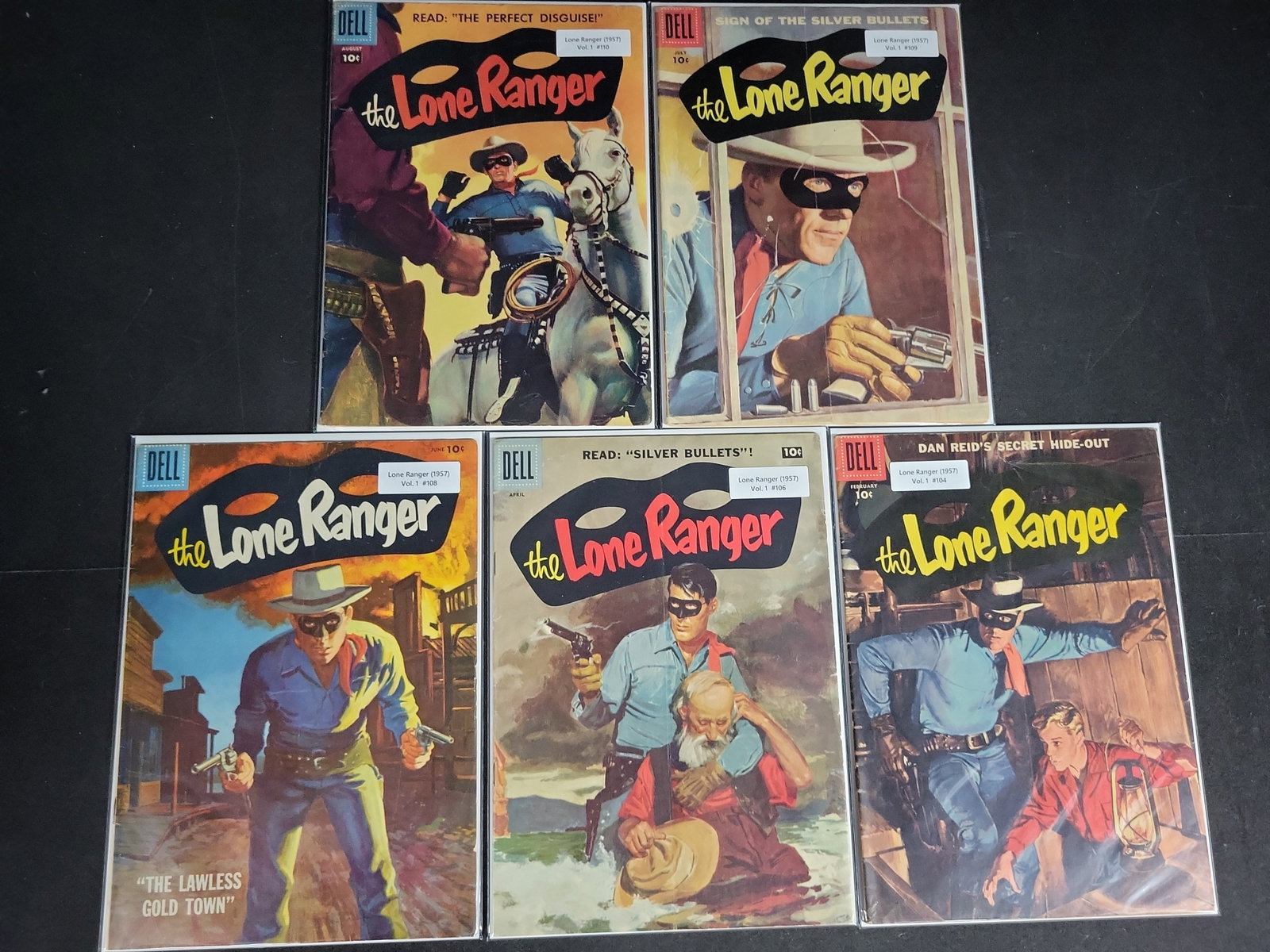 I04786 | Collection of Dell Lone Ranger Comics: IMPORTANT â€“ PLEASE REVIEW BEFORE BIDDING: Aeron House makes every effort to accurately identify and describe each lot; however, titles and descriptions may contain errors, omissions, or AI-a