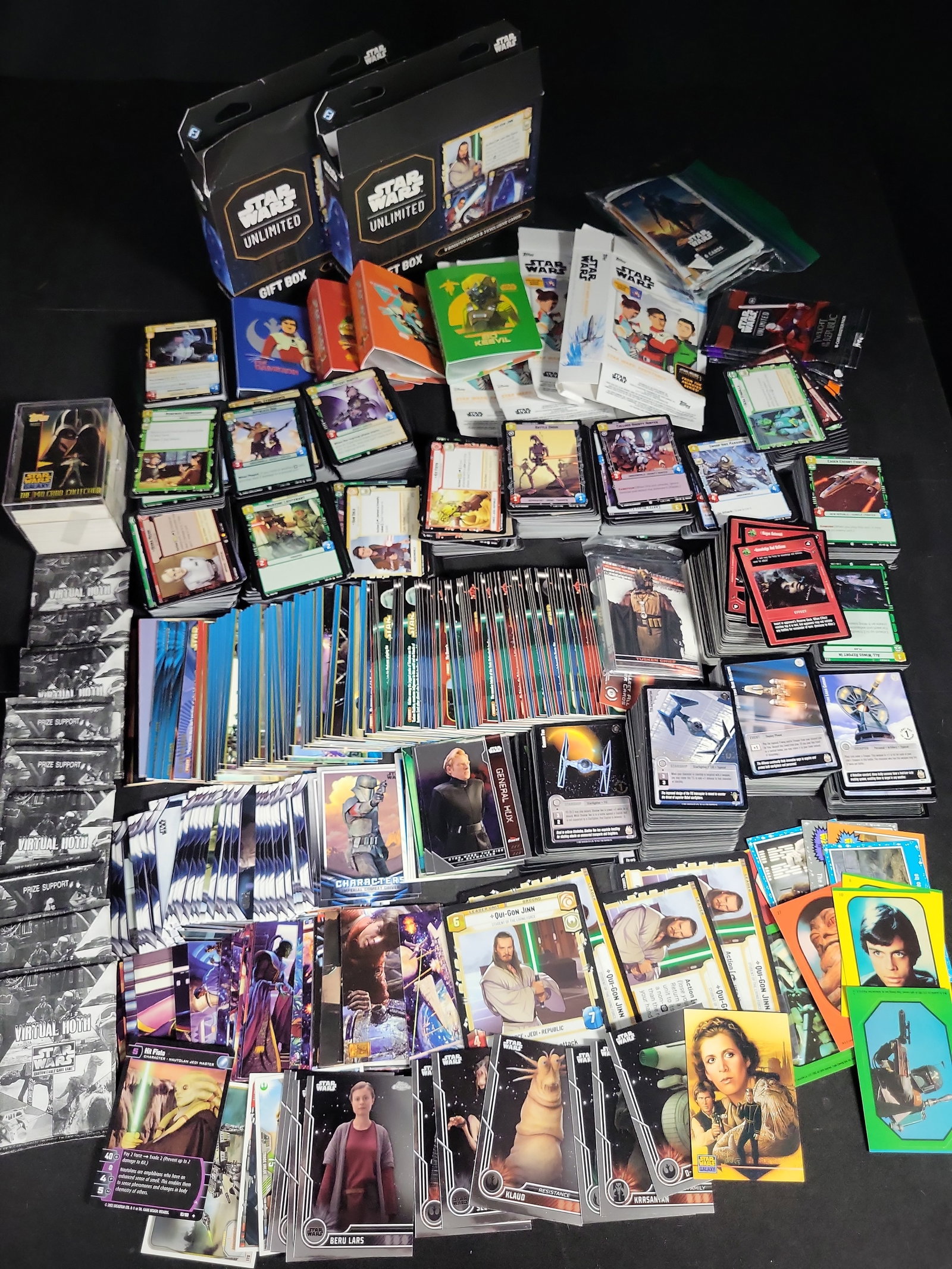 I04692 | Large Star Wars Trading Card Lot: IMPORTANT â€“ PLEASE REVIEW BEFORE BIDDING: Aeron House makes every effort to accurately identify and describe each lot; however, titles and descriptions may contain errors, omissions, or AI-a