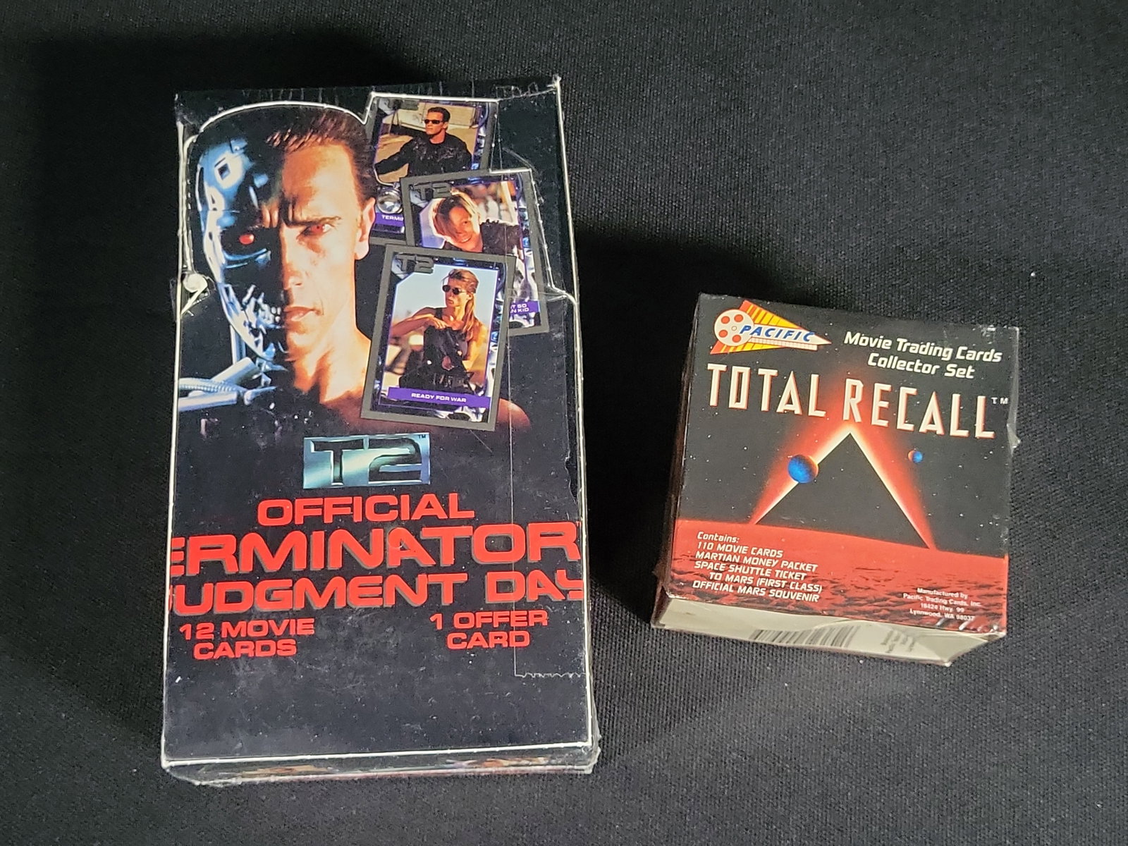 I04866 | Two Sealed Arnold Schwarzenegger Card Sets: IMPORTANT â€“ PLEASE REVIEW BEFORE BIDDING: Aeron House makes every effort to accurately identify and describe each lot; however, titles and descriptions may contain errors, omissions, or AI-a