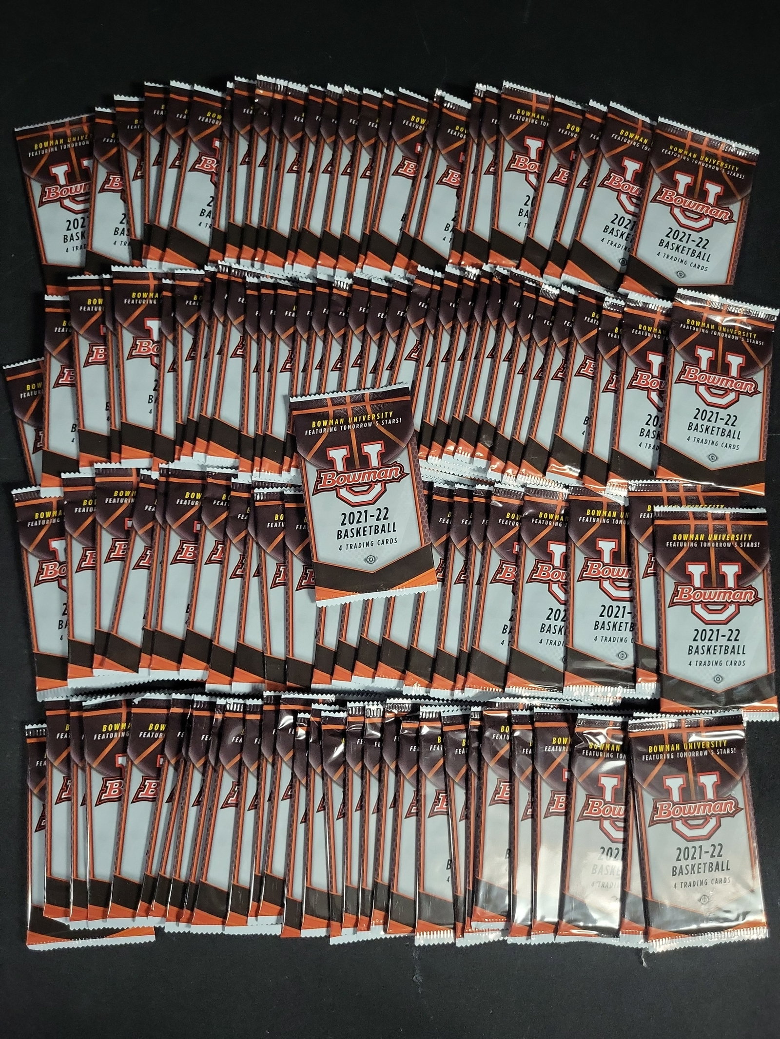 I04370 | 112 Unopened 2021-22 Bowman Basketball Packs: IMPORTANT â€“ PLEASE REVIEW BEFORE BIDDING: Aeron House makes every effort to accurately identify and describe each lot; however, titles and descriptions may contain errors, omissions, or AI-a