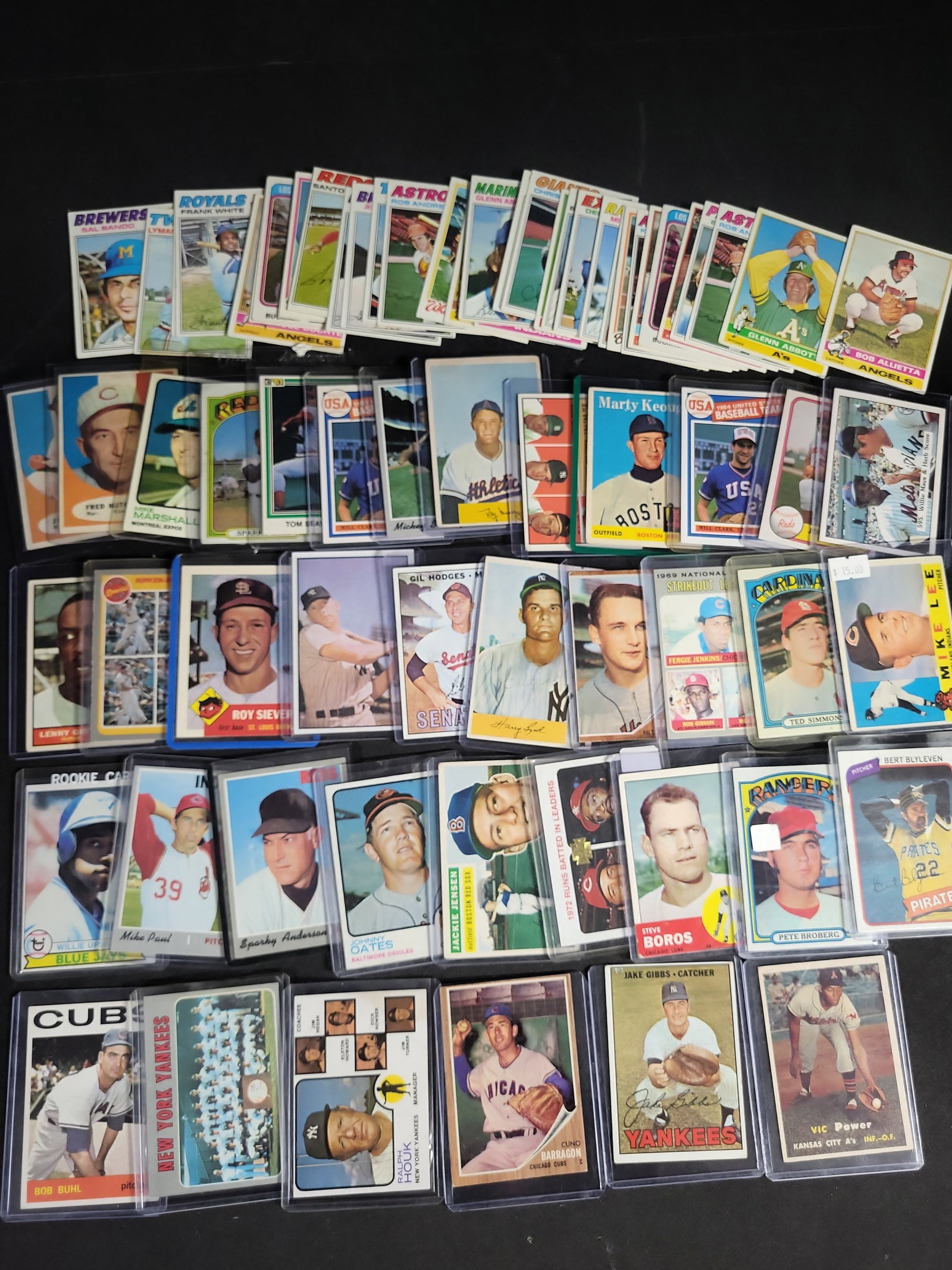 I04257 | Collection of Vintage Baseball Cards: IMPORTANT â€“ PLEASE REVIEW BEFORE BIDDING: Aeron House makes every effort to accurately identify and describe each lot; however, titles and descriptions may contain errors, omissions, or AI-a