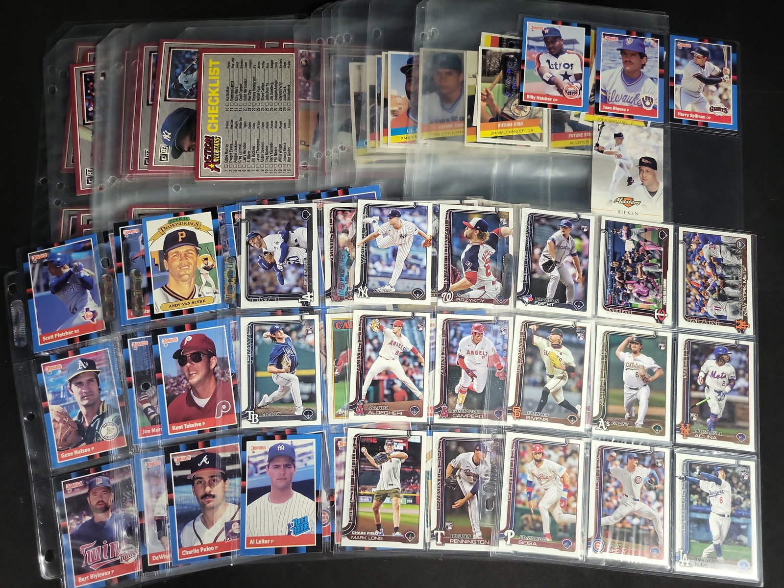 I04253 | Assorted Vintage and Modern Baseball Cards: IMPORTANT â€“ PLEASE REVIEW BEFORE BIDDING: Aeron House makes every effort to accurately identify and describe each lot; however, titles and descriptions may contain errors, omissions, or AI-a