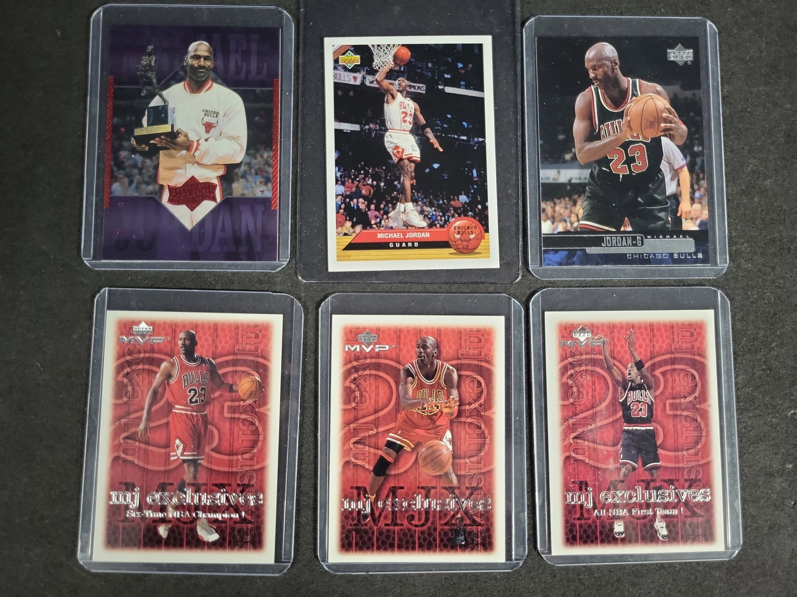 I04640 | Six Michael Jordan Upper Deck Cards: IMPORTANT â€“ PLEASE REVIEW BEFORE BIDDING: Aeron House makes every effort to accurately identify and describe each lot; however, titles and descriptions may contain errors, omissions, or AI-a
