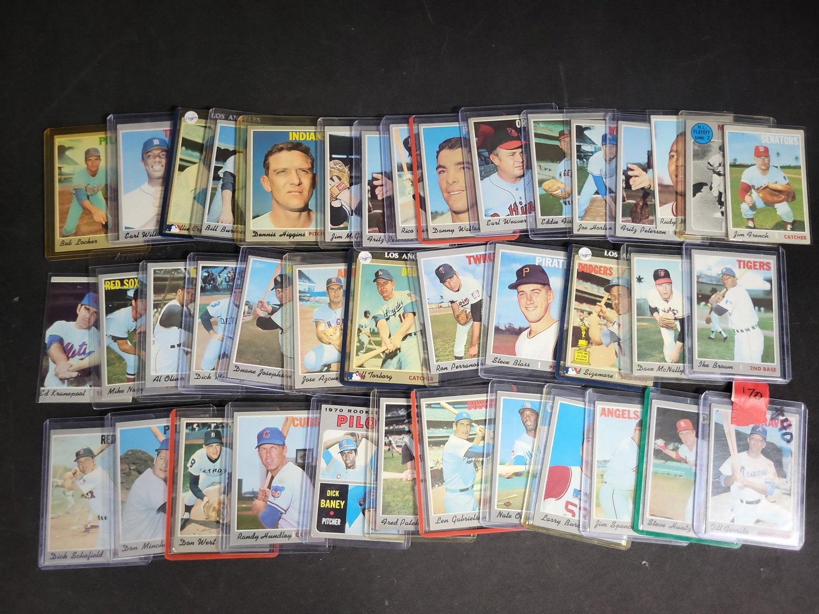 I04246 | Collection of Vintage Topps Baseball Cards: IMPORTANT â€“ PLEASE REVIEW BEFORE BIDDING: Aeron House makes every effort to accurately identify and describe each lot; however, titles and descriptions may contain errors, omissions, or AI-a