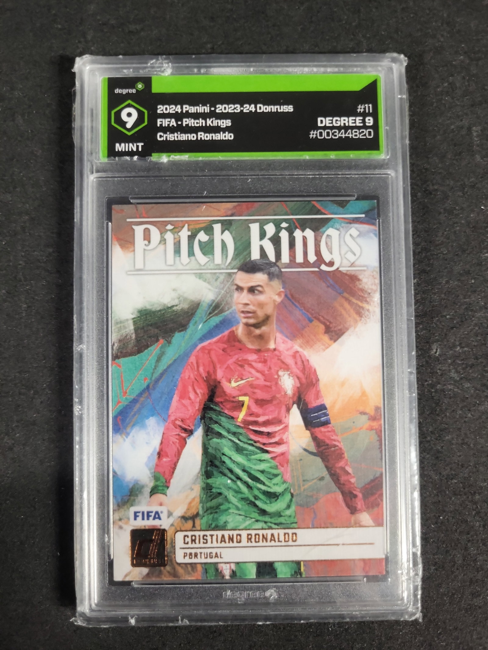 I04236 | Graded Panini Donruss Ronaldo Card: IMPORTANT â€“ PLEASE REVIEW BEFORE BIDDING: Aeron House makes every effort to accurately identify and describe each lot; however, titles and descriptions may contain errors, omissions, or AI-a