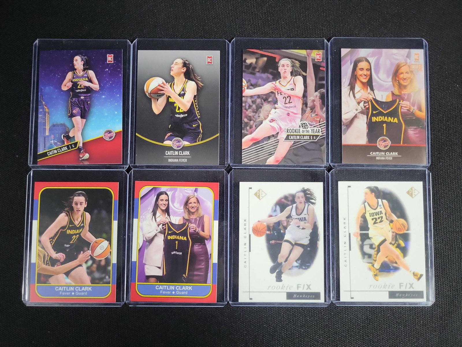 I04848 | Eight Caitlin Clark Rookie Basketball Cards: IMPORTANT â€“ PLEASE REVIEW BEFORE BIDDING: Aeron House makes every effort to accurately identify and describe each lot; however, titles and descriptions may contain errors, omissions, or AI-a