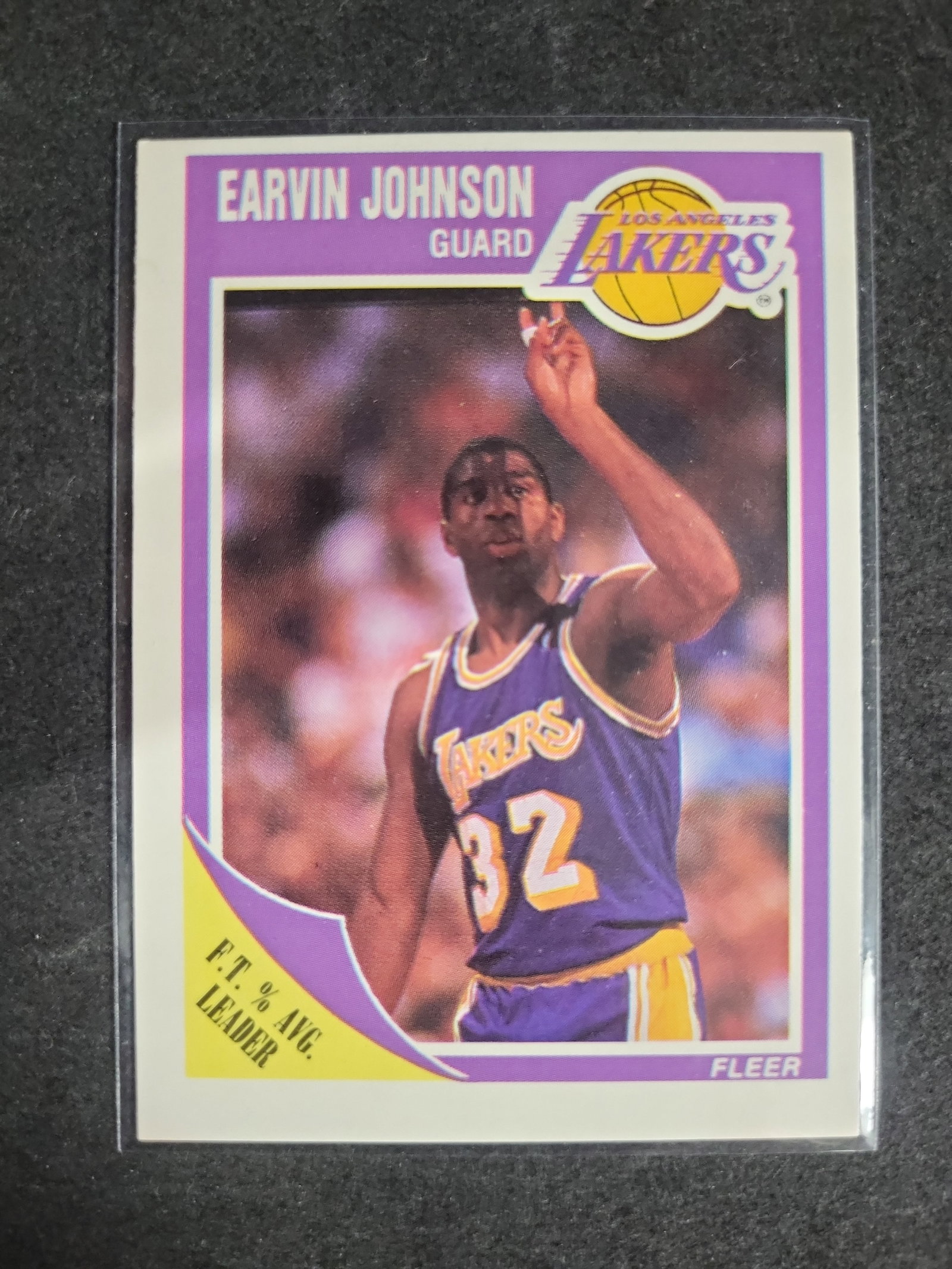 I04268 | 1989 Fleer Magic Johnson Basketball Card: IMPORTANT â€“ PLEASE REVIEW BEFORE BIDDING: Aeron House makes every effort to accurately identify and describe each lot; however, titles and descriptions may contain errors, omissions, or AI-a