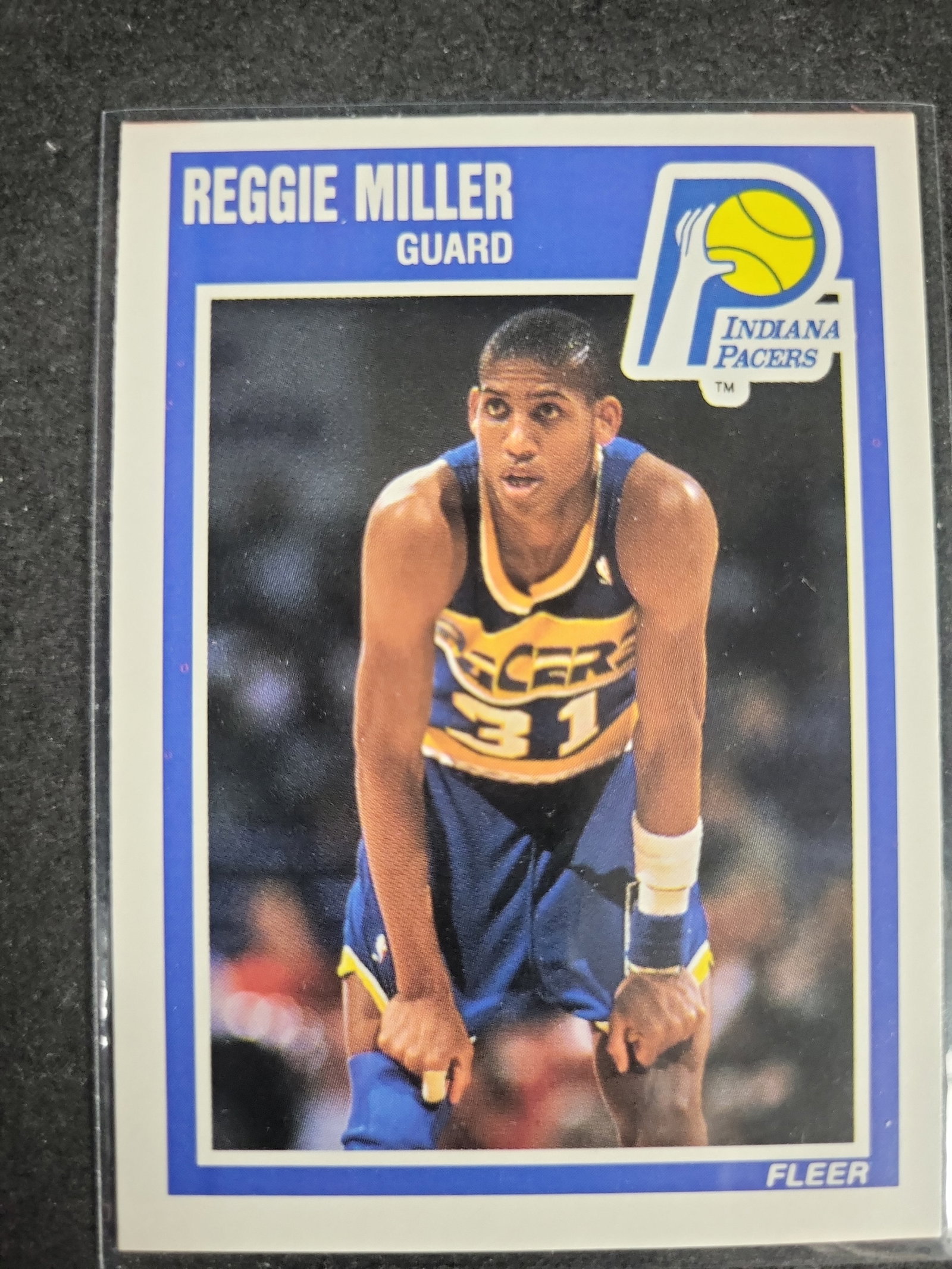 I04291 | 1989 Fleer Reggie Miller Card: IMPORTANT â€“ PLEASE REVIEW BEFORE BIDDING: Aeron House makes every effort to accurately identify and describe each lot; however, titles and descriptions may contain errors, omissions, or AI-a