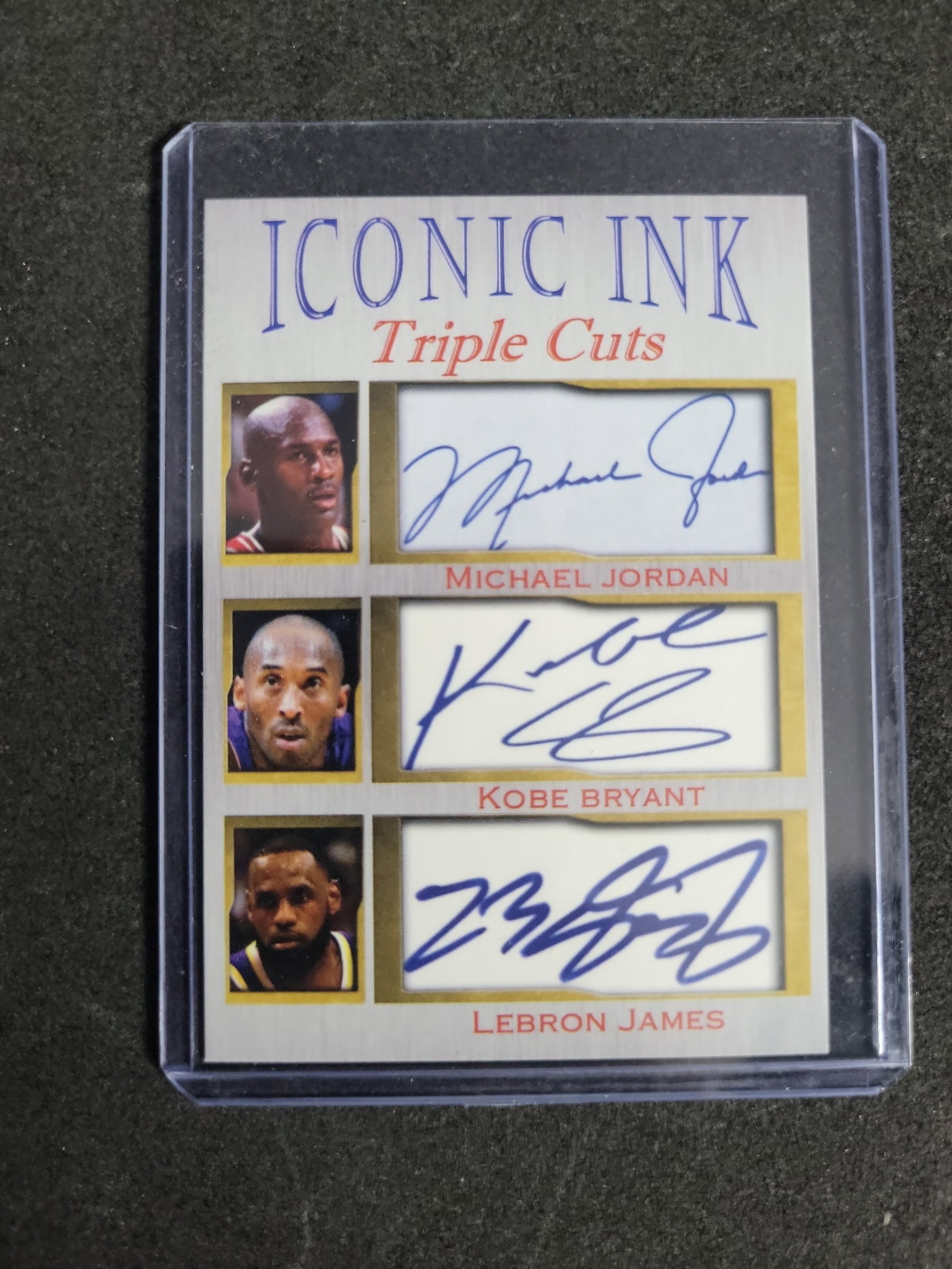 I03288 | Iconic Ink Triple Cuts Michael Jordan Kobe Bryant and LeBron James Facsimile Autograph Card: IMPORTANT â€“ PLEASE REVIEW BEFORE BIDDING: Aeron House makes every effort to accurately identify and describe each lot; however, titles and descriptions may contain errors, omissions, or AI-a