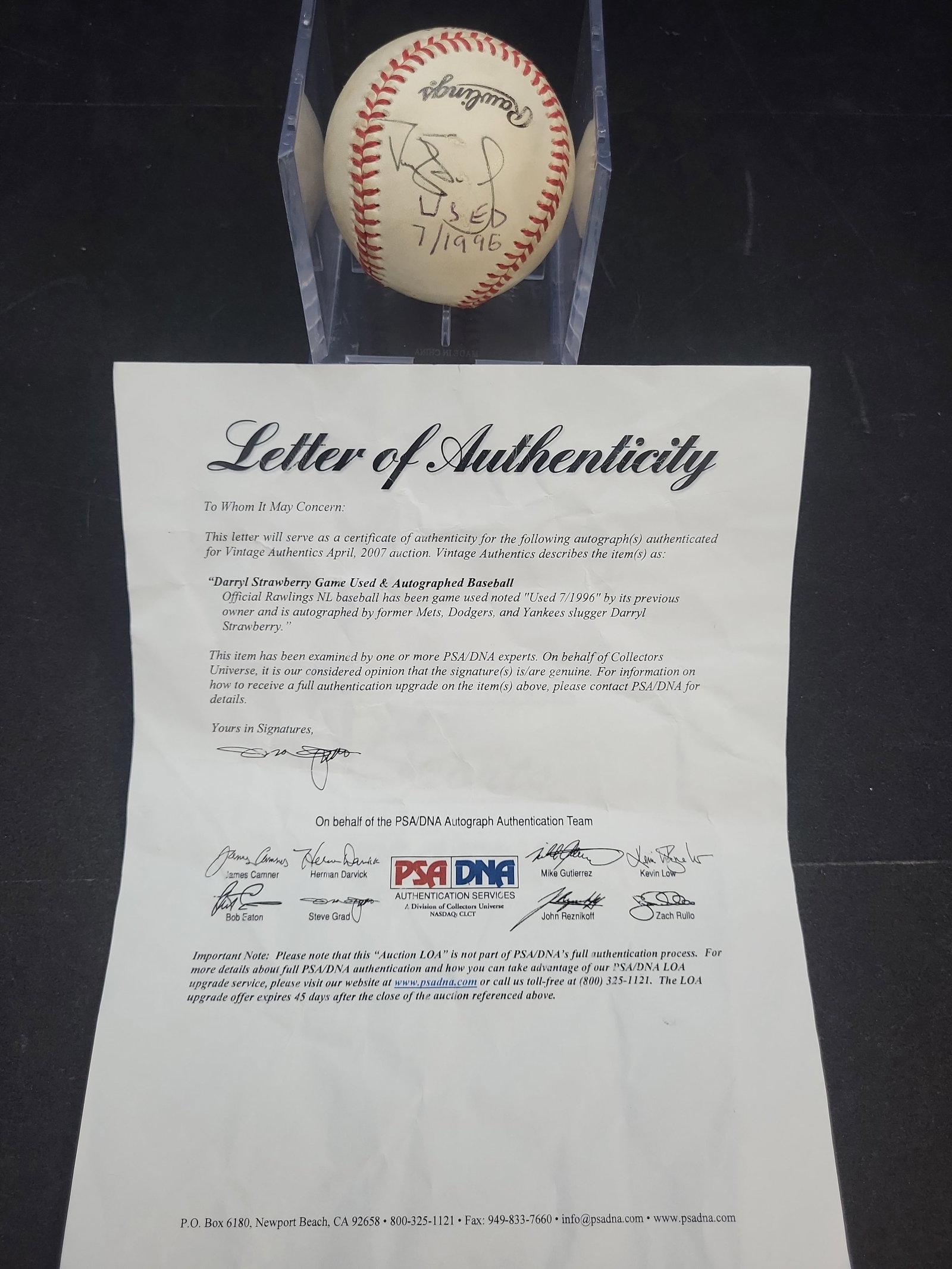 I04156 | Signed Darryl Strawberry Baseball PSA/DNA: IMPORTANT â€“ PLEASE REVIEW BEFORE BIDDING: Aeron House makes every effort to accurately identify and describe each lot; however, titles and descriptions may contain errors, omissions, or AI-a