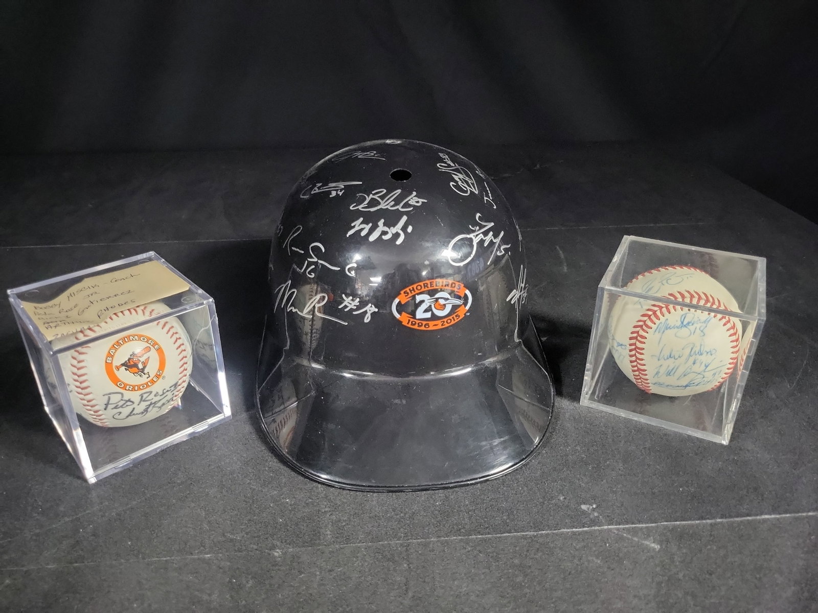 I04367 | Signed Orioles and Shorebirds Memorabilia: IMPORTANT â€“ PLEASE REVIEW BEFORE BIDDING: Aeron House makes every effort to accurately identify and describe each lot; however, titles and descriptions may contain errors, omissions, or AI-a