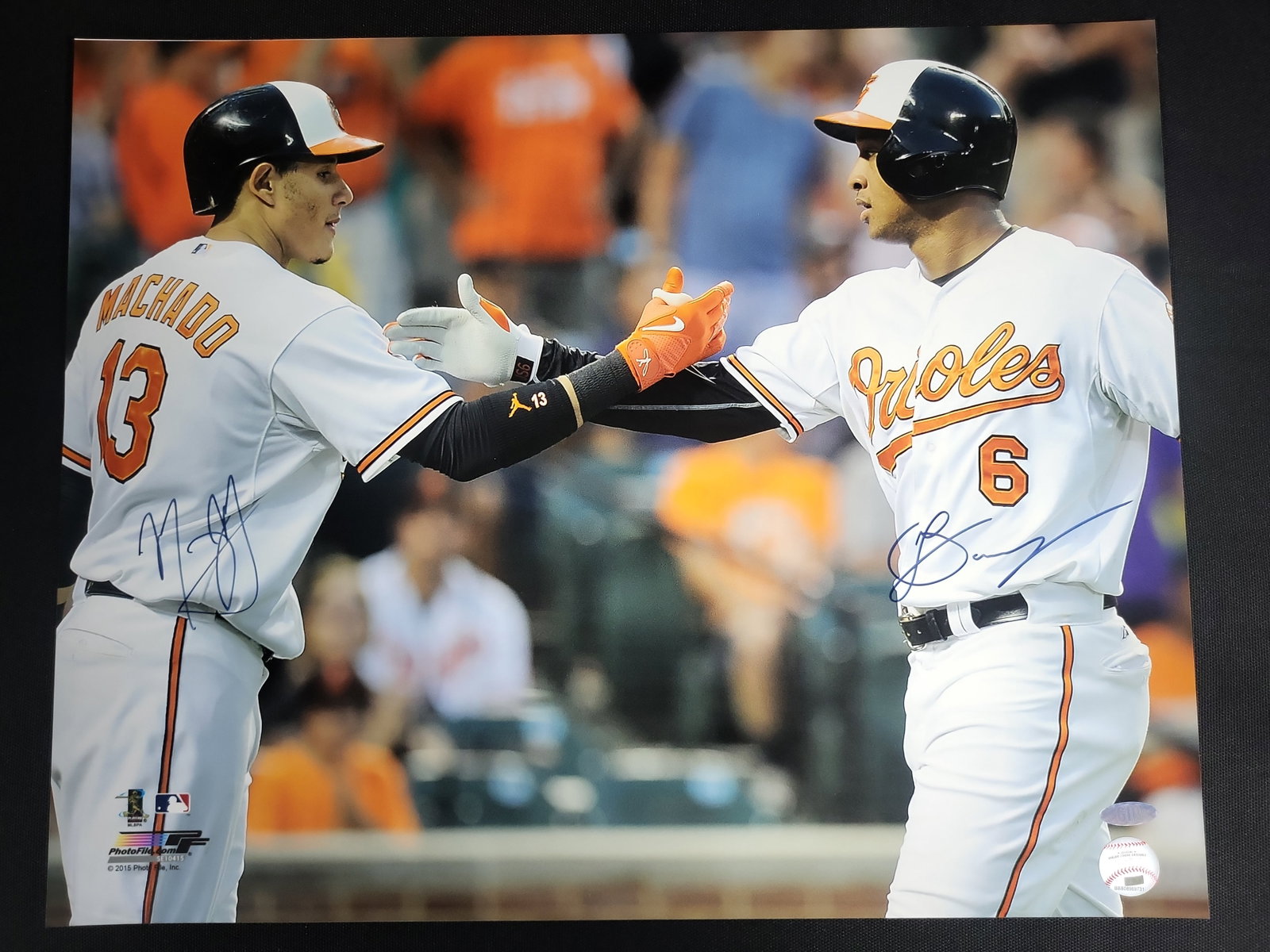 I04863 | Signed Orioles Photo... MLB: IMPORTANT â€“ PLEASE REVIEW BEFORE BIDDING: Aeron House makes every effort to accurately identify and describe each lot; however, titles and descriptions may contain errors, omissions, or AI-a