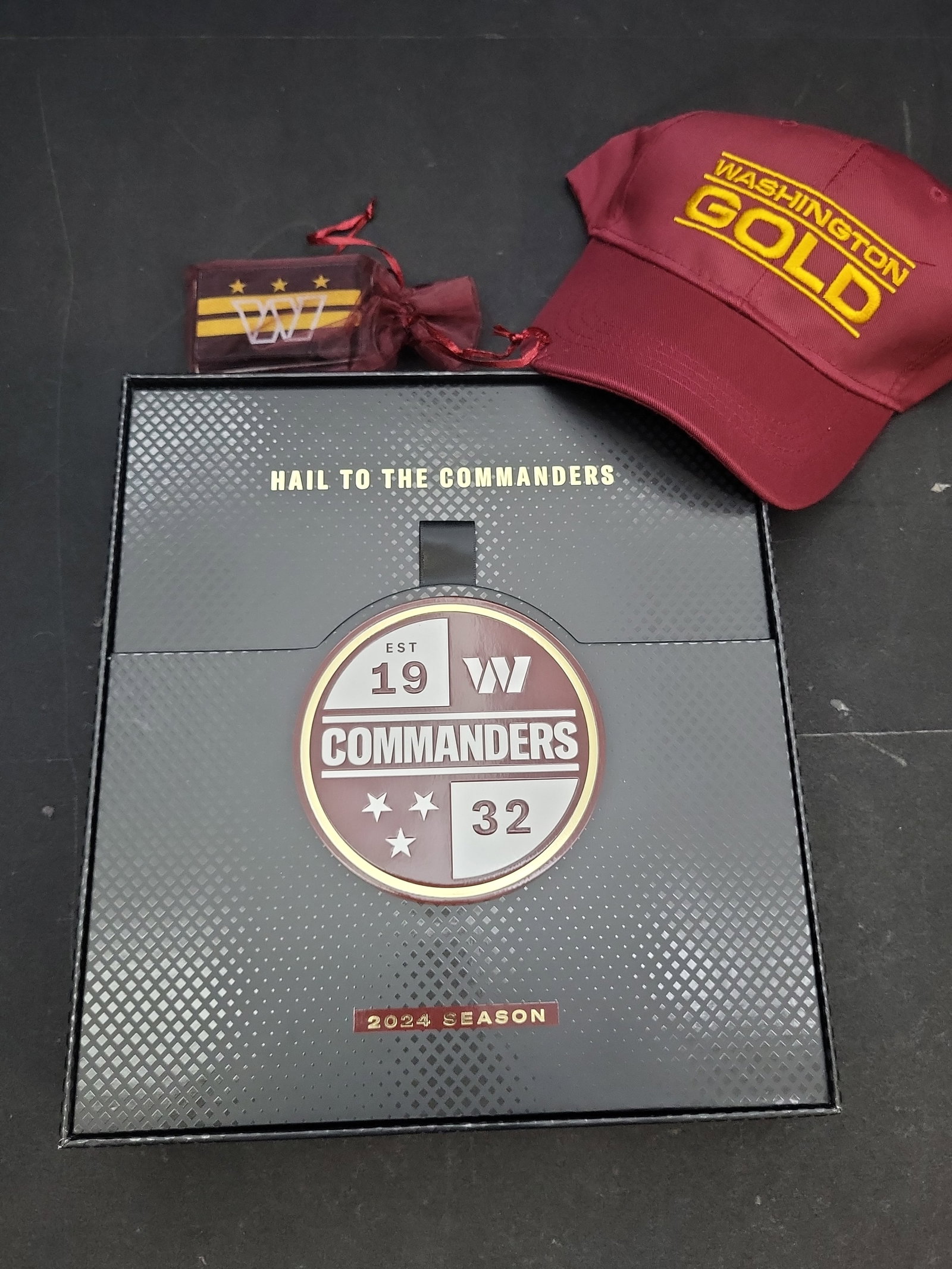 I04710 | Washington Commanders 2024 Member Box Set: IMPORTANT â€“ PLEASE REVIEW BEFORE BIDDING: Aeron House makes every effort to accurately identify and describe each lot; however, titles and descriptions may contain errors, omissions, or AI-a