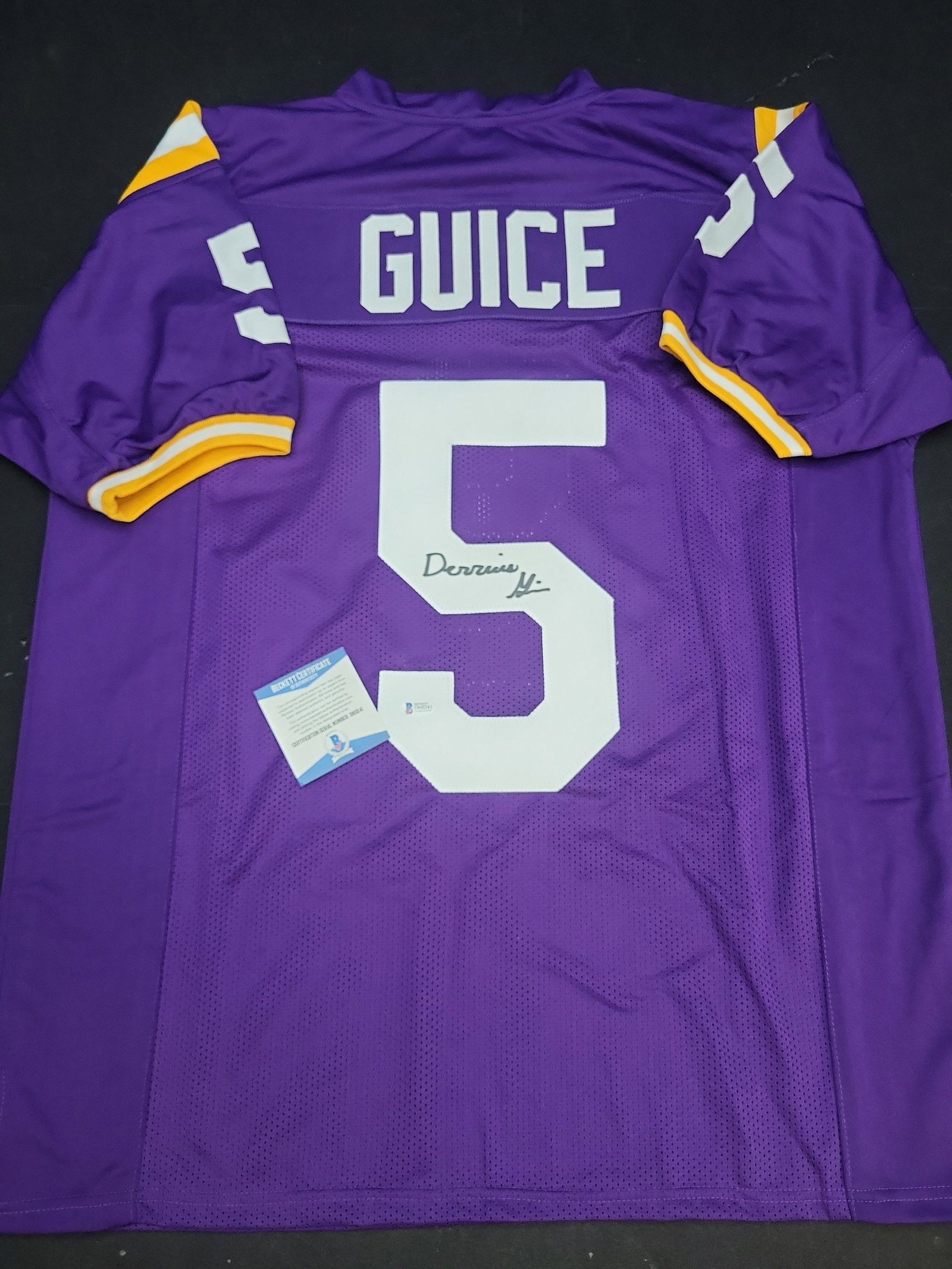 I04328 | Signed Derrius Guice Football Jersey Beckett: IMPORTANT â€“ PLEASE REVIEW BEFORE BIDDING: Aeron House makes every effort to accurately identify and describe each lot; however, titles and descriptions may contain errors, omissions, or AI-a