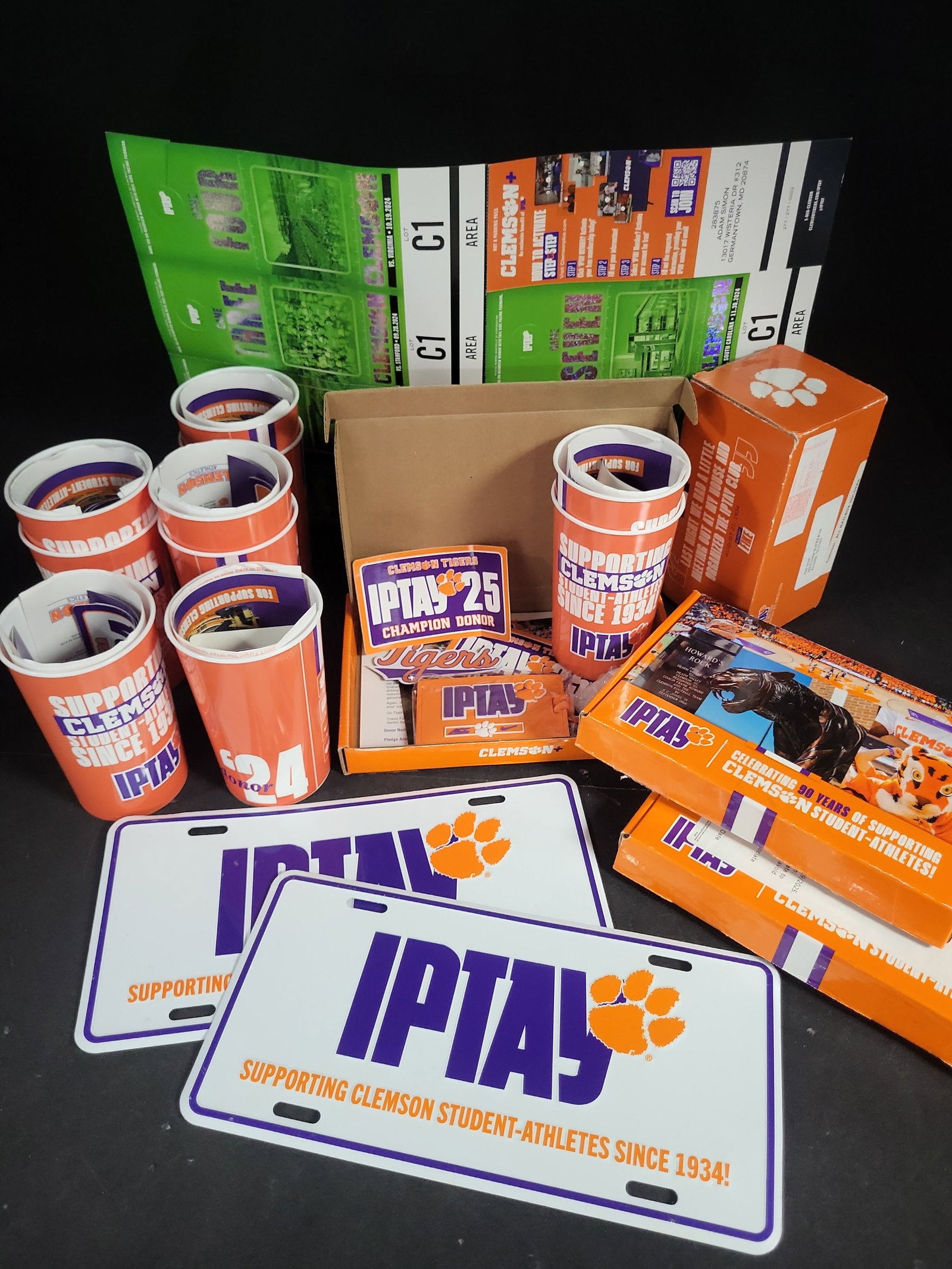 I04712 | Collection of Clemson IPTAY Donor Memorabilia: IMPORTANT â€“ PLEASE REVIEW BEFORE BIDDING: Aeron House makes every effort to accurately identify and describe each lot; however, titles and descriptions may contain errors, omissions, or AI-a