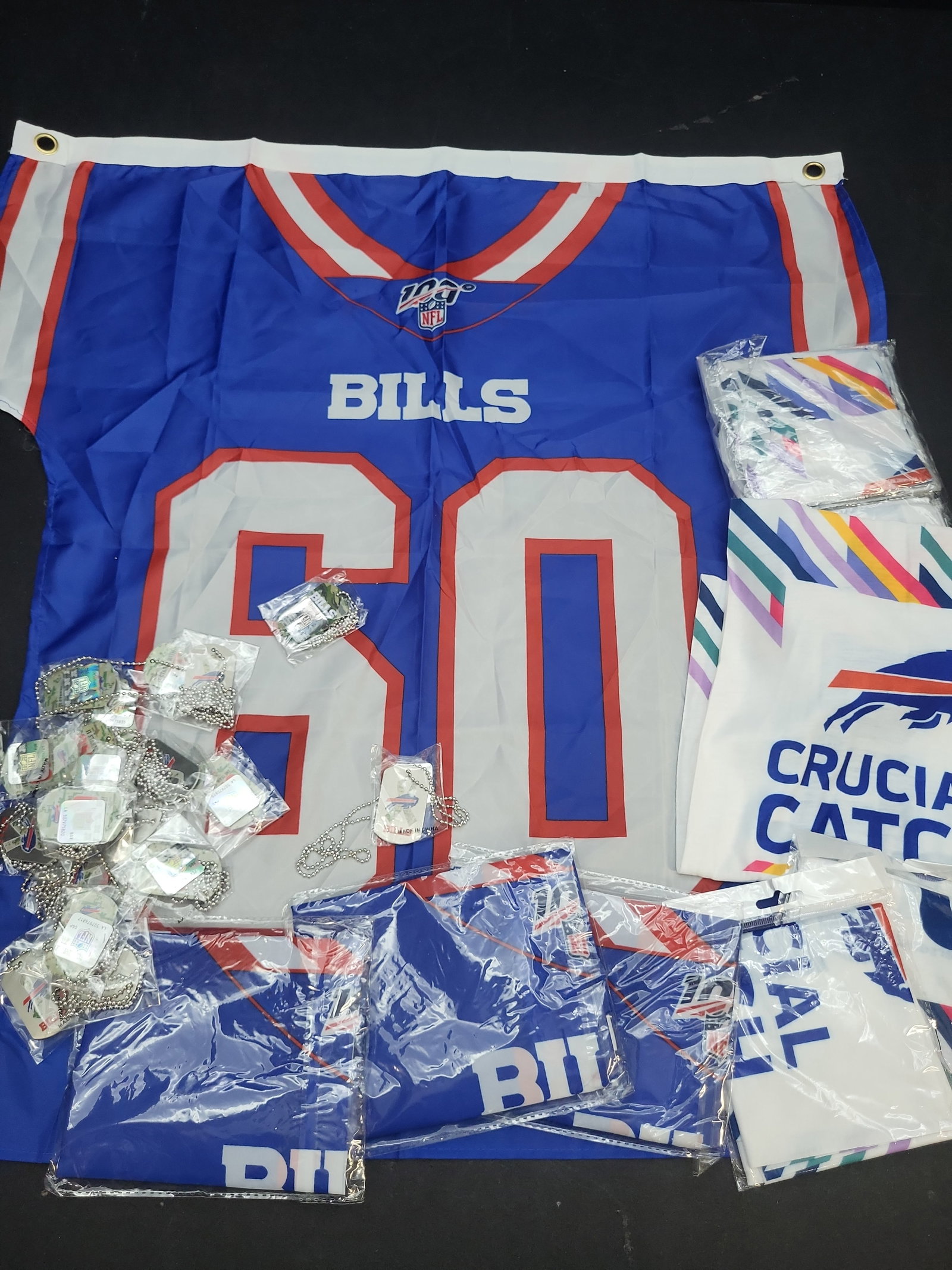 I04723 | Buffalo Bills NFL Memorabilia Collection: IMPORTANT â€“ PLEASE REVIEW BEFORE BIDDING: Aeron House makes every effort to accurately identify and describe each lot; however, titles and descriptions may contain errors, omissions, or AI-a