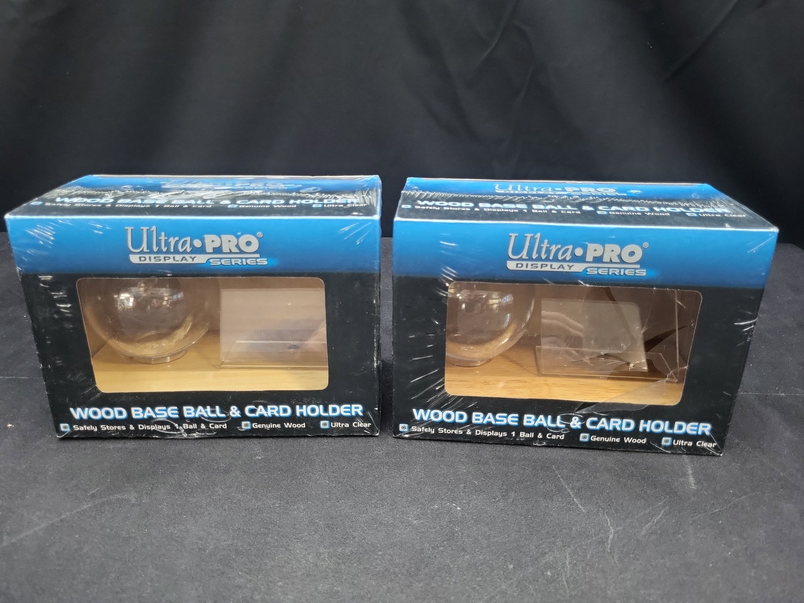 I04470 | A Pair of Ultra-PRO Baseball Display Cases: IMPORTANT â€“ PLEASE REVIEW BEFORE BIDDING: Aeron House makes every effort to accurately identify and describe each lot; however, titles and descriptions may contain errors, omissions, or AI-a