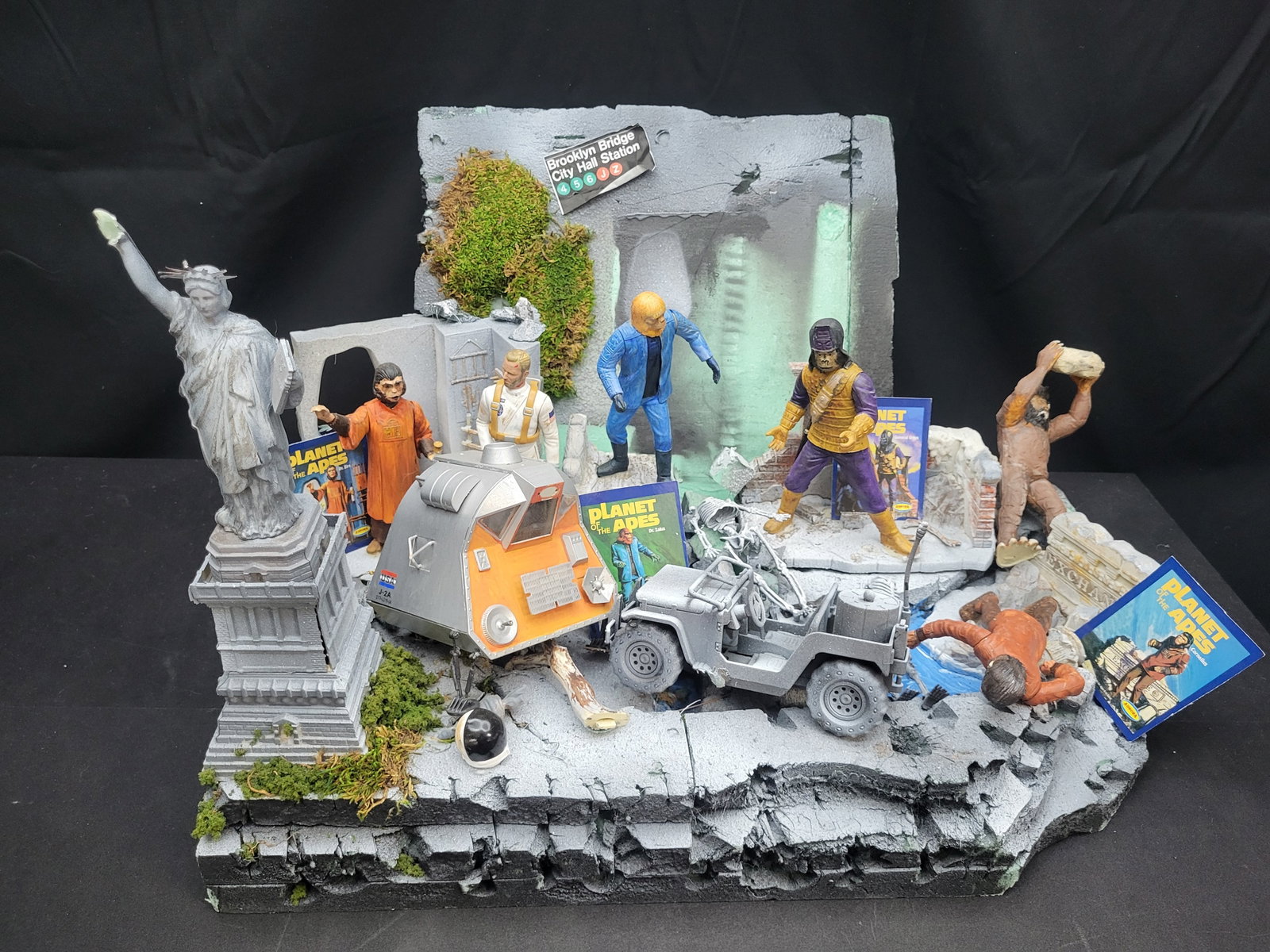 I04657 | Custom Planet of the Apes Diorama Assembly: IMPORTANT â€“ PLEASE REVIEW BEFORE BIDDING: Aeron House makes every effort to accurately identify and describe each lot; however, titles and descriptions may contain errors, omissions, or AI-a