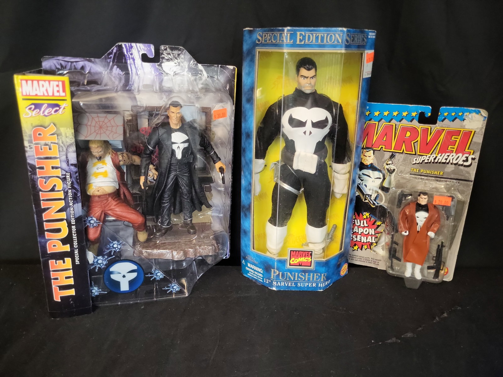 I04303 | A Trio of Punisher Action Figures: IMPORTANT â€“ PLEASE REVIEW BEFORE BIDDING: Aeron House makes every effort to accurately identify and describe each lot; however, titles and descriptions may contain errors, omissions, or AI-a