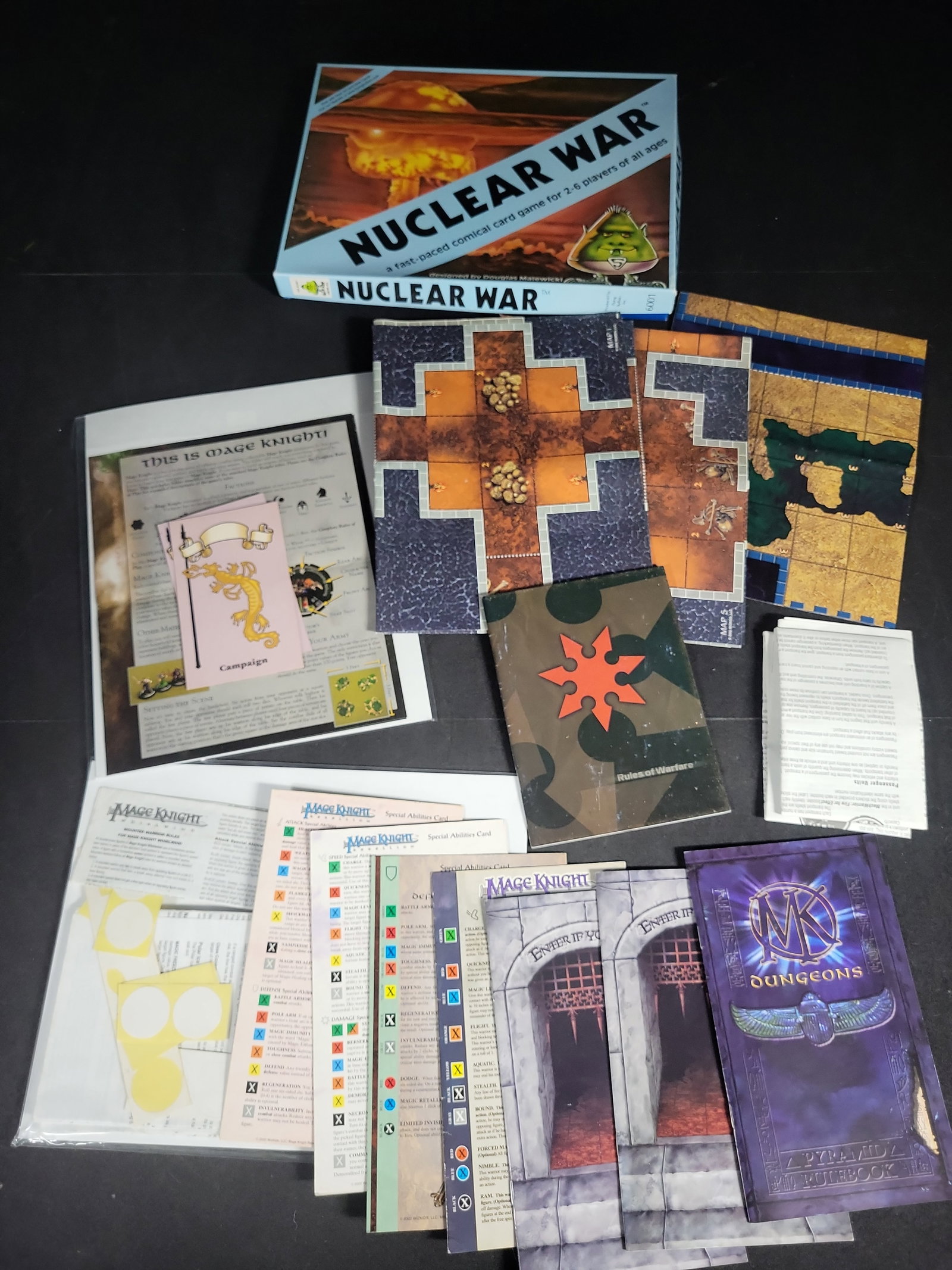 I04687 | Flying Buffalo and WizKids Game Collection: IMPORTANT â€“ PLEASE REVIEW BEFORE BIDDING: Aeron House makes every effort to accurately identify and describe each lot; however, titles and descriptions may contain errors, omissions, or AI-a