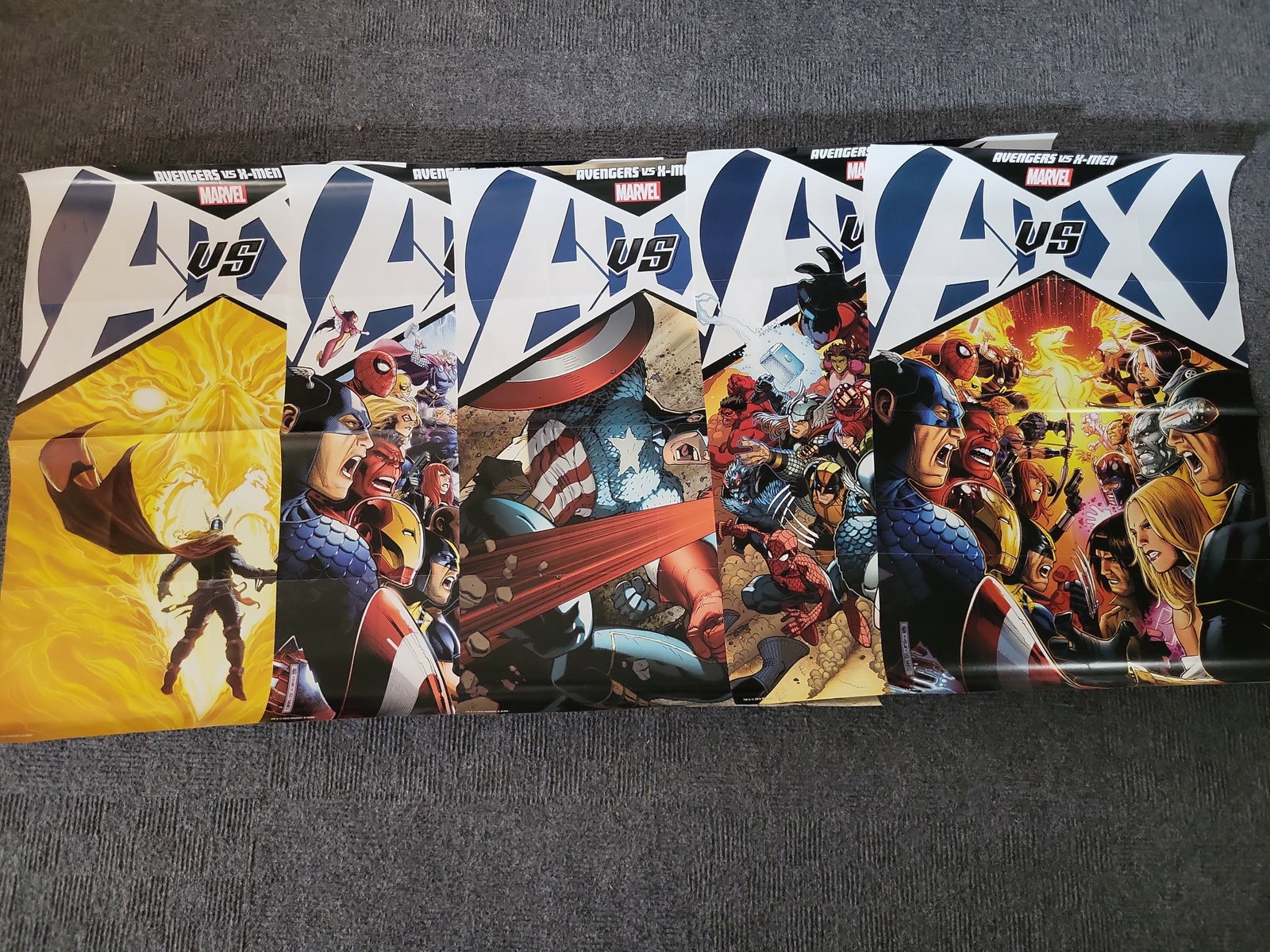 I04609 | Five Avengers vs. X-Men Posters: IMPORTANT â€“ PLEASE REVIEW BEFORE BIDDING: Aeron House makes every effort to accurately identify and describe each lot; however, titles and descriptions may contain errors, omissions, or AI-a