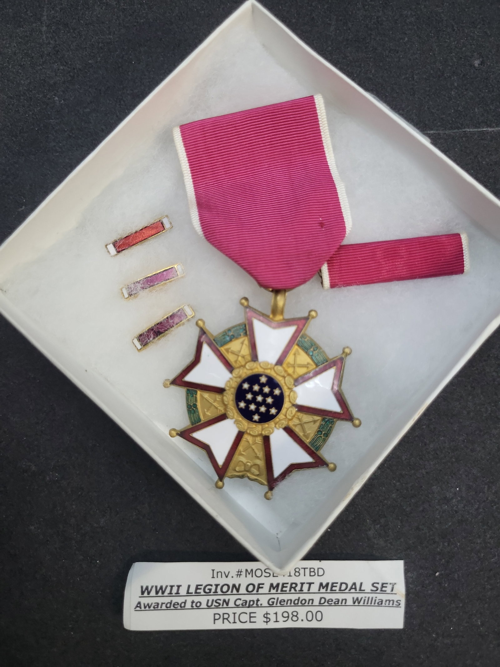 I04147 | WWII US Legion of Merit Medal Set: IMPORTANT â€“ PLEASE REVIEW BEFORE BIDDING: Aeron House makes every effort to accurately identify and describe each lot; however, titles and descriptions may contain errors, omissions, or AI-a
