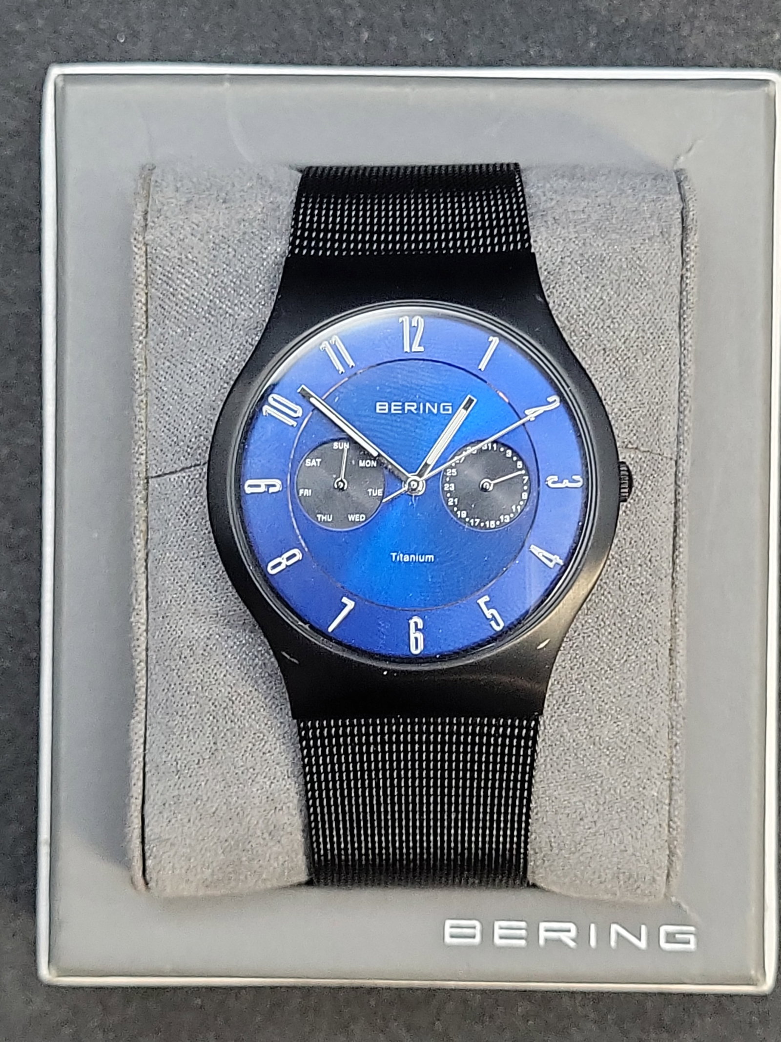 I04148 | Bering Titanium Blue Dial Wristwatch: IMPORTANT â€“ PLEASE REVIEW BEFORE BIDDING: Aeron House makes every effort to accurately identify and describe each lot; however, titles and descriptions may contain errors, omissions, or AI-a