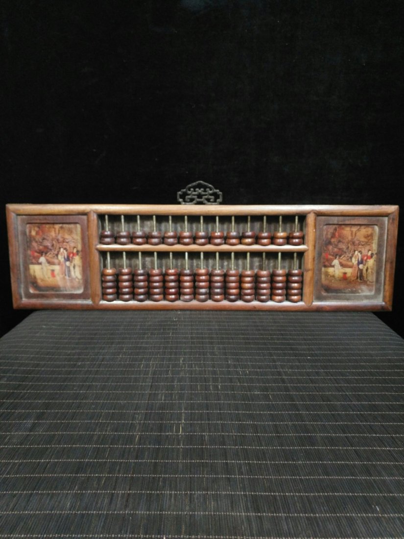 Huanghuali Wooden Frame Inlaid Lady's Figure "abacus": The shape of the device is atmospheric, and the copper shaft has thirteen gears. Ancient supercomputers are not only good helpers in business, but also have extraordinary wisdom. It is also a treasure