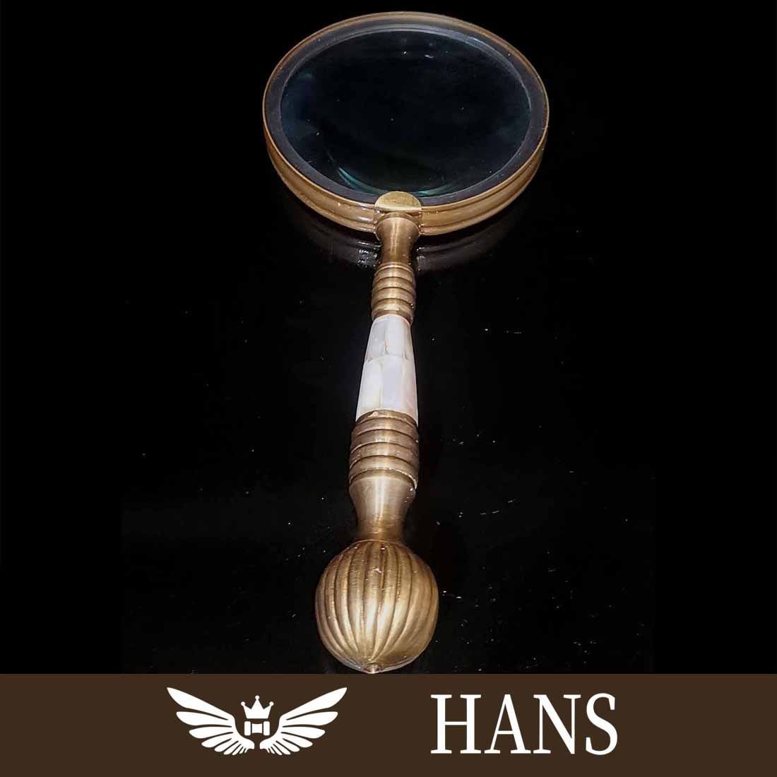 Copper inlaid shell magnifying glass: Copper inlaid shell magnifying glass High 25CM wide 10cm 322g Freight: 1.International Freight: Foreign shipping charges are determined by destination. 2.Photos, descriptions and valuations have been 