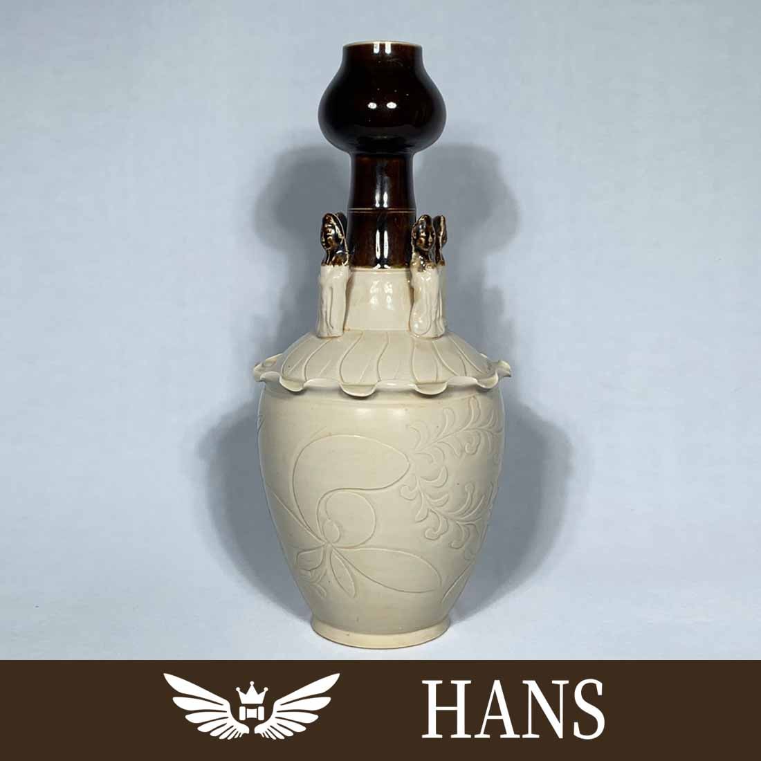 Song Dynasty Ding kiln carved flower pattern two-color garlic bottle (1 of 9)
