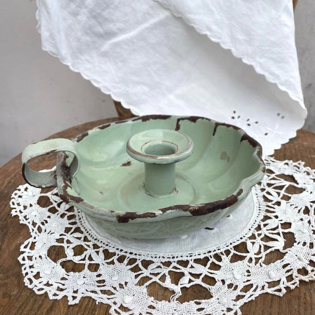 British antique enamel candle holder: British antique enamel candle holderhe gentle green color is very cute and goes particularly well with shabby chic interiors.The loose, streamlined shape gives it a feminine feel, so I displayed it wi