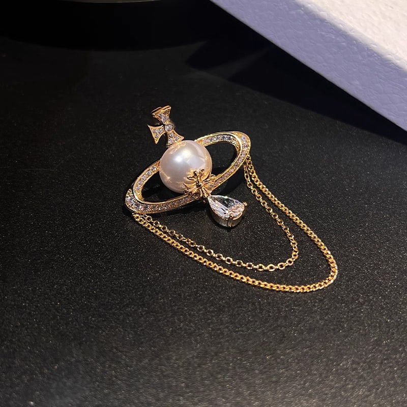 Saturn Tassel Pearl Rhinestone Brooch Women's Corsage Pin: Saturn Tassel Pearl Rhinestone Brooch Women's Corsage Pin Freight: 1.International Freight: Foreign shipping charges are determined by destination. 2.Photos, descriptions and valuations have been meti