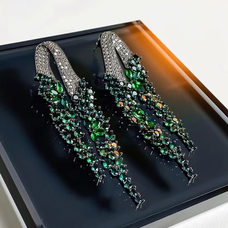 Tassel Earrings: Size: 75*23mm Material: emerald green synthetic zirconium, 925 silver needle Product weight: 9.3g*2 Freight: 1.International Freight: Foreign shipping charges are determined by destination. 2.Photos, 
