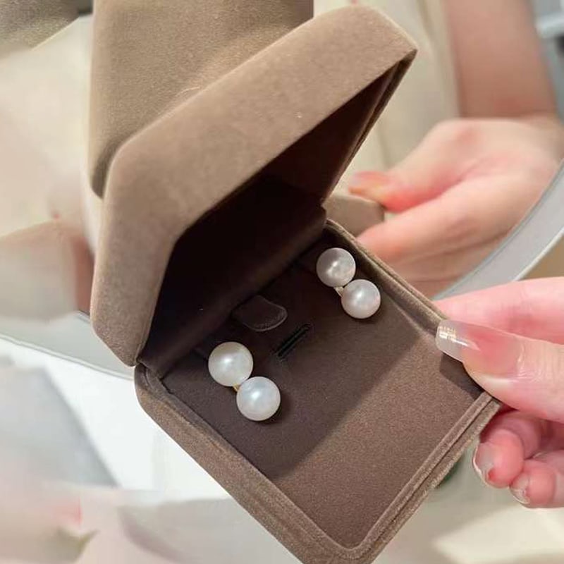 18K gold straight double ball large earrings design: Natural bright flawless freshwater pearls Freight: 1.International Freight: Foreign shipping charges are determined by destination. 2.Photos, descriptions and valuations have been meticulously prepare