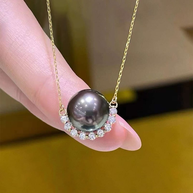 18K Tahitian Black Pearl Necklace: 9-10mm perfect circle strong light basically flawless Freight: 1.International Freight: Foreign shipping charges are determined by destination. 2.Photos, descriptions and valuations have been meticulo