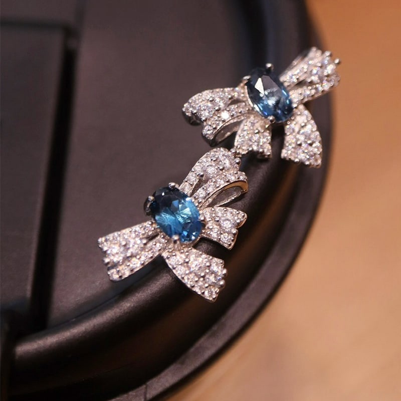 s925 sterling silver inlaid with  plated natural London blue topaz earrings (1 of 2)